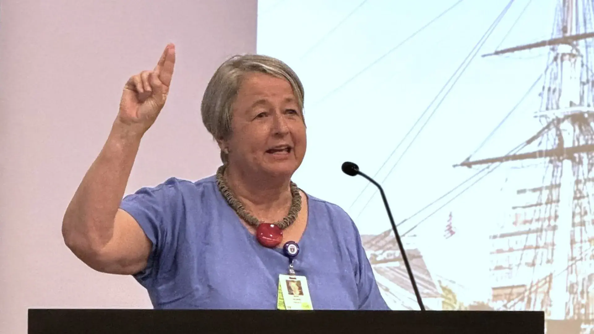 Woman speaking at podium