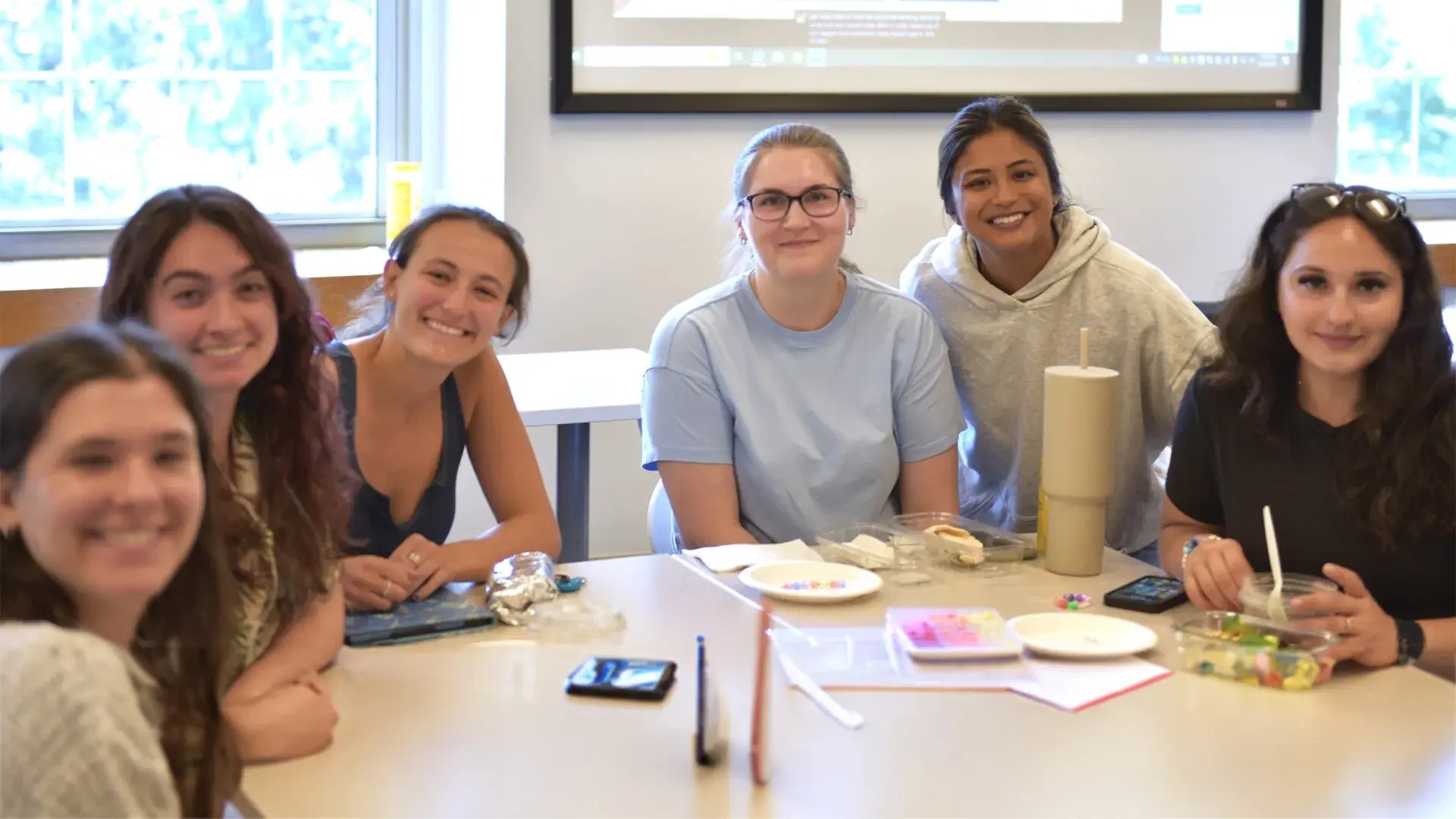 Six students smiling