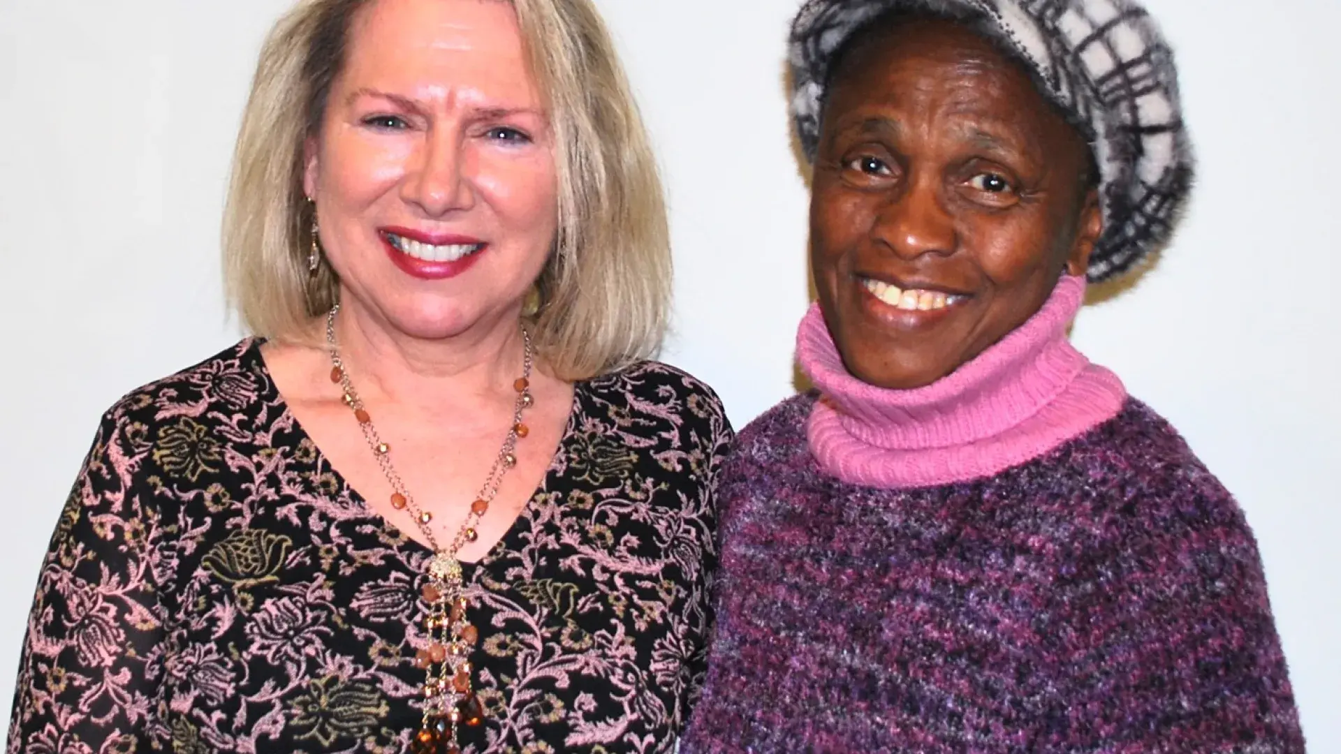 Two women posing for a photo