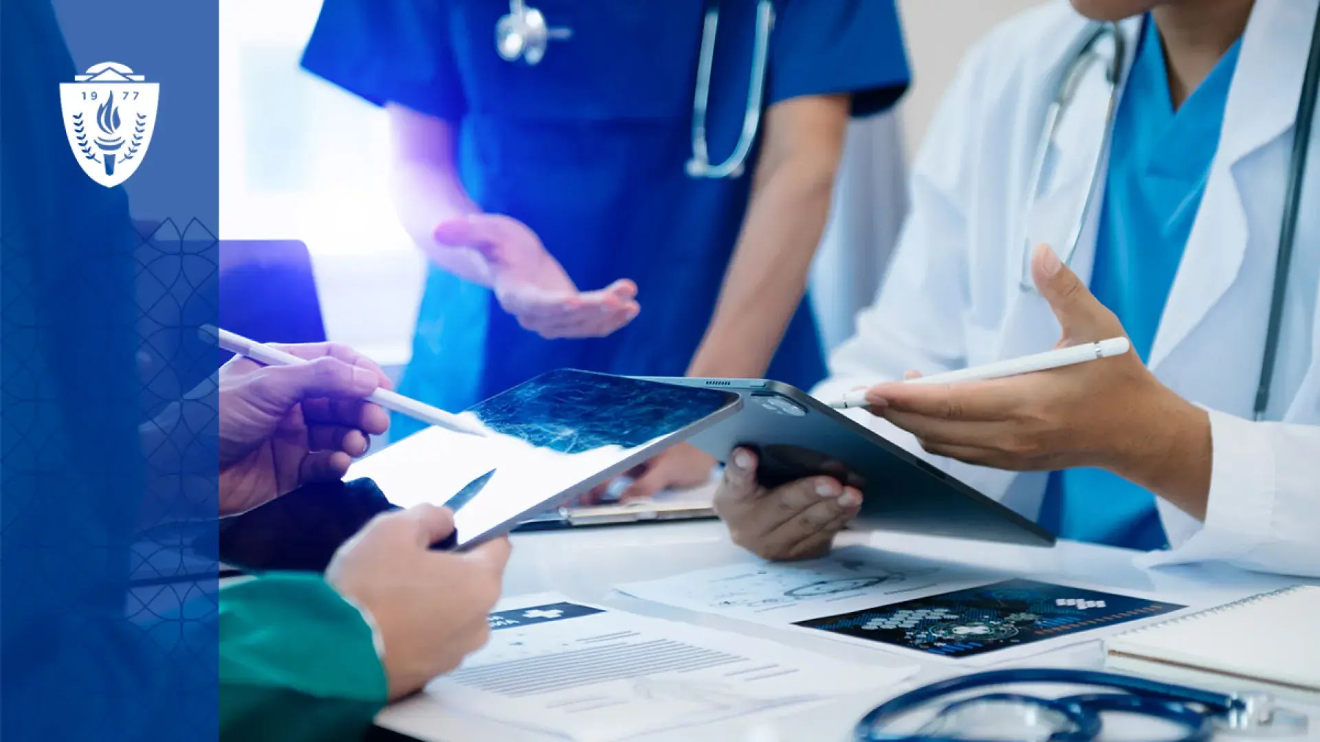 closeup of hands using tablets, the people are wearing lab coats and stethoscopes
