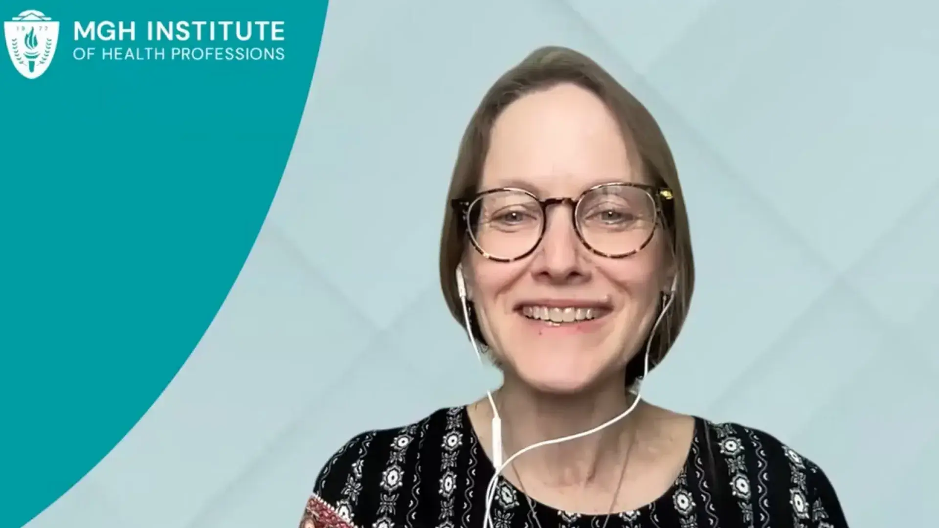 woman with glasses and earbuds