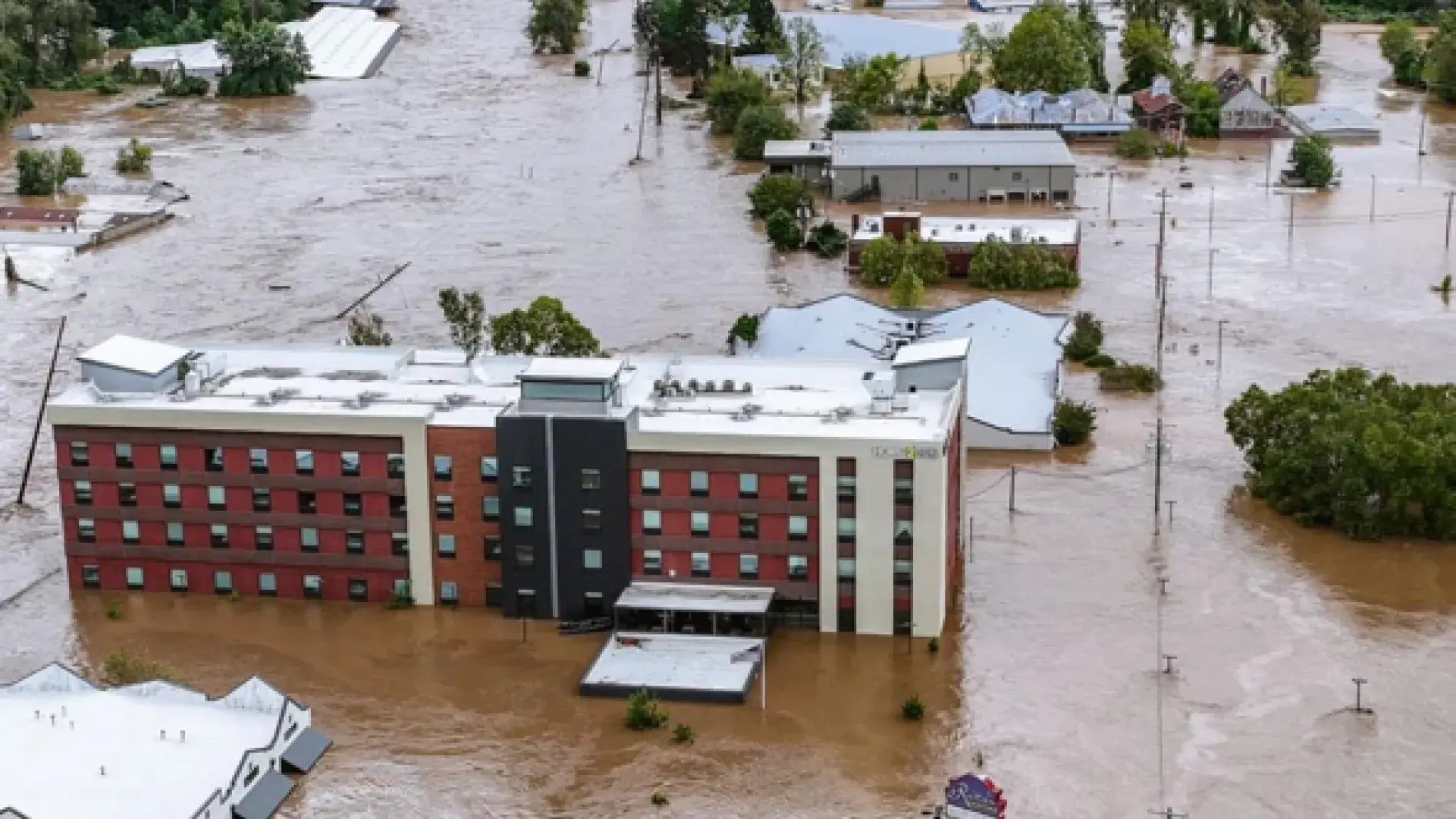 Buildings are surrounded by floodwaters 