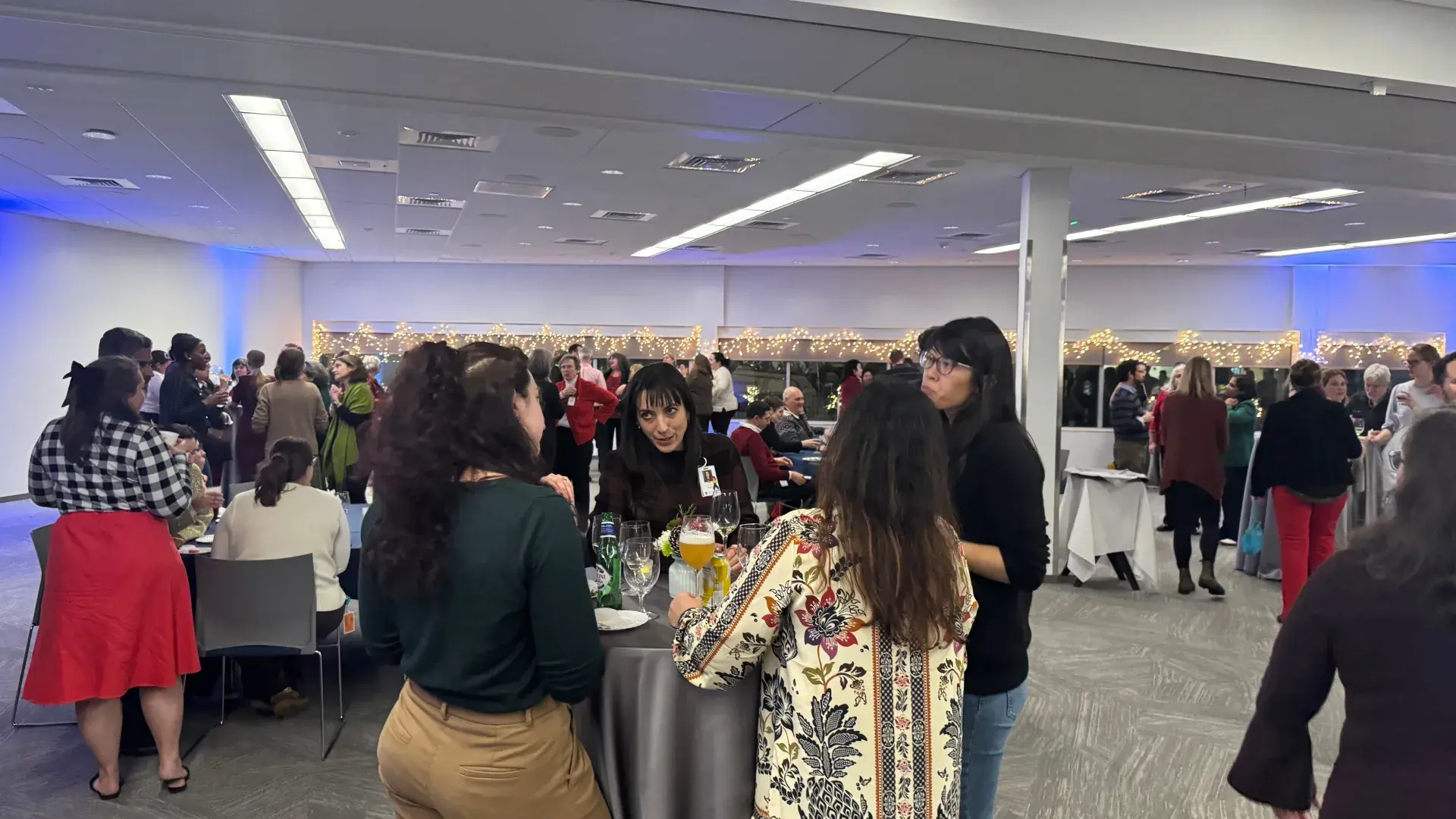 room full of people in a social setting