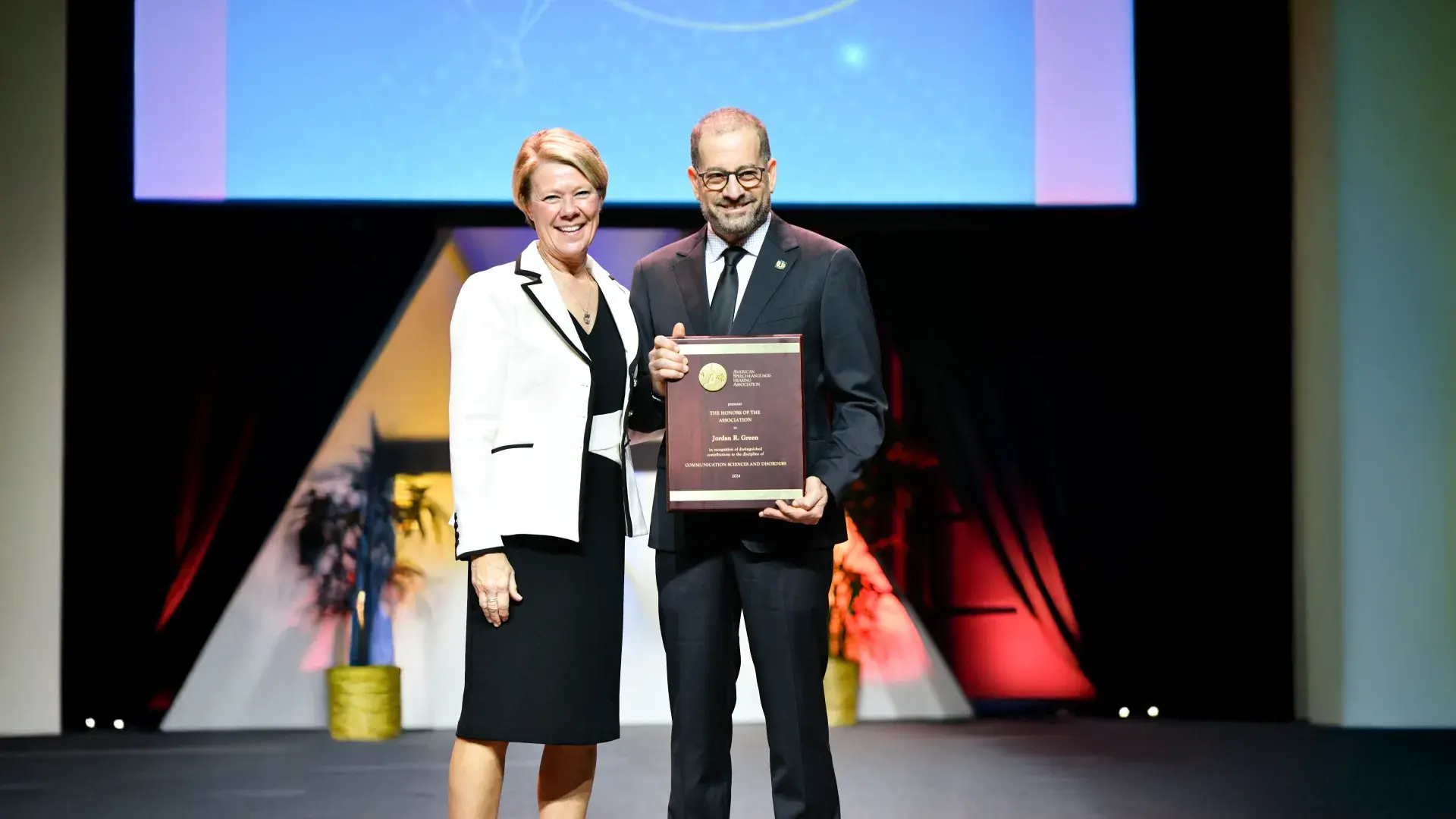 jordan green with his award