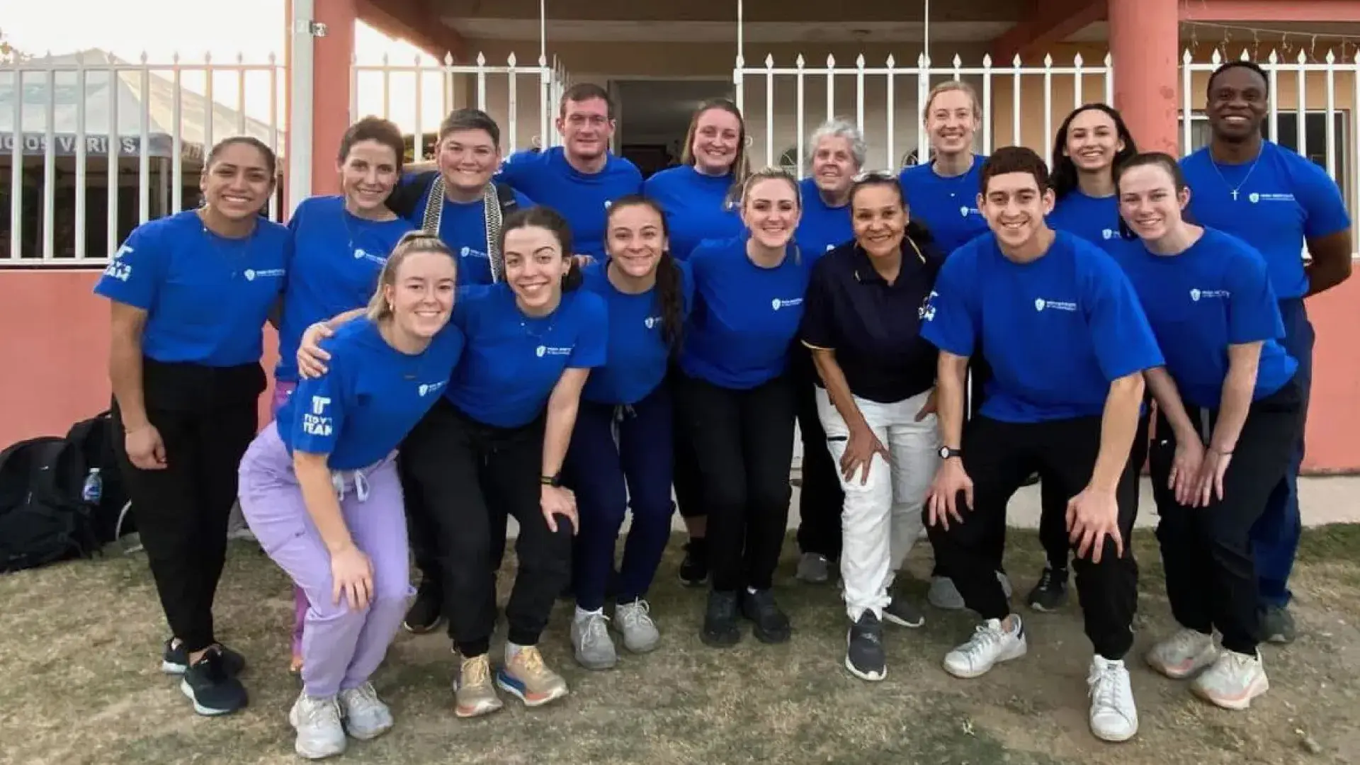 group of students posing outside of Guatemalan clinic 