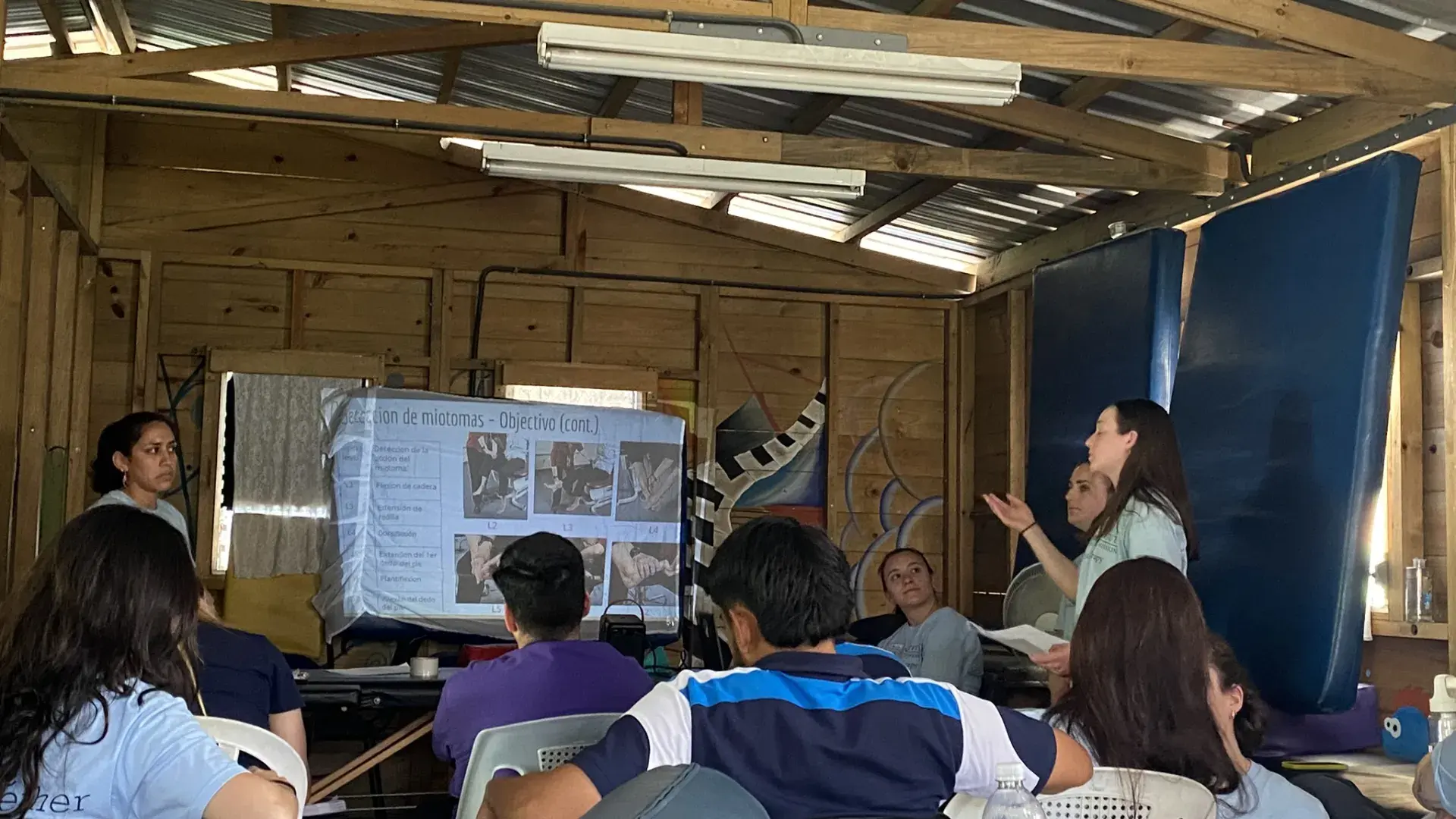 students presenting to Guatemalan counterparts 