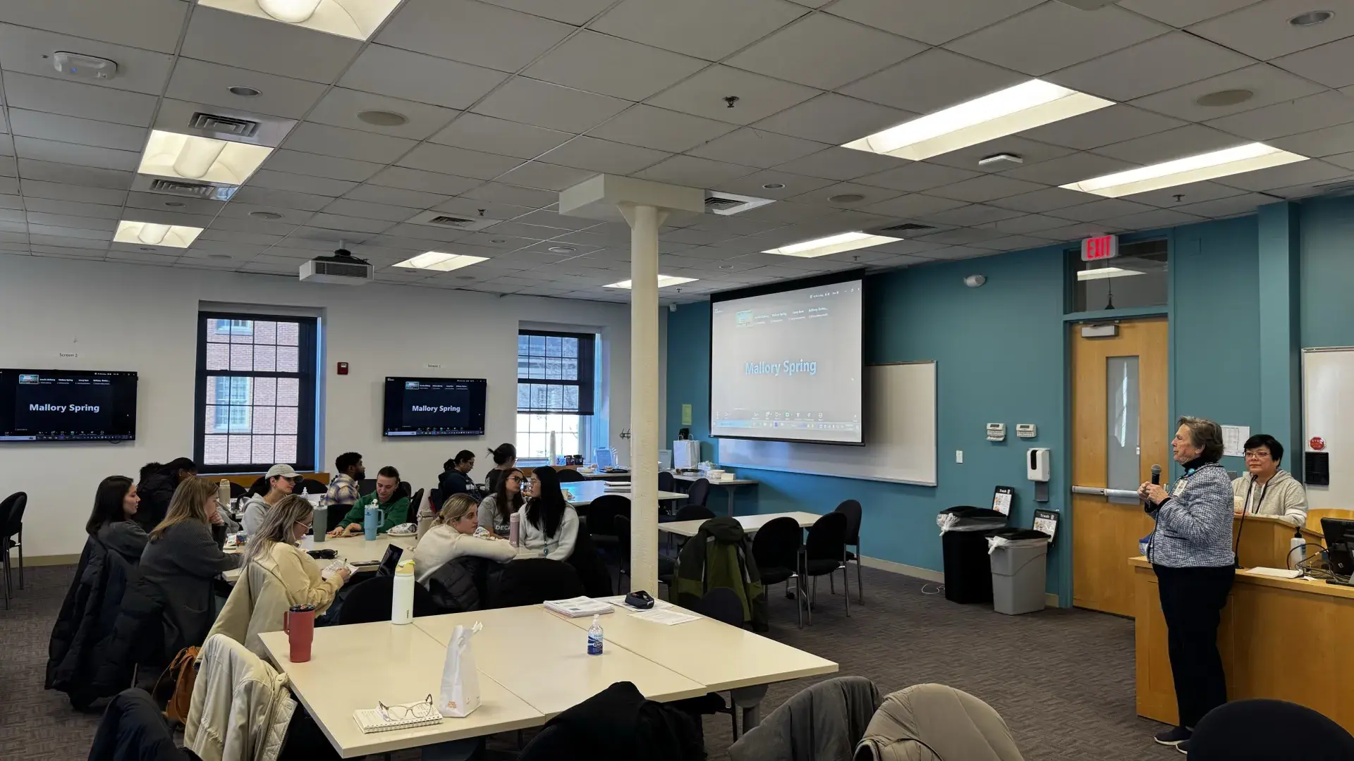 Two women answer student questions at Town Hall 