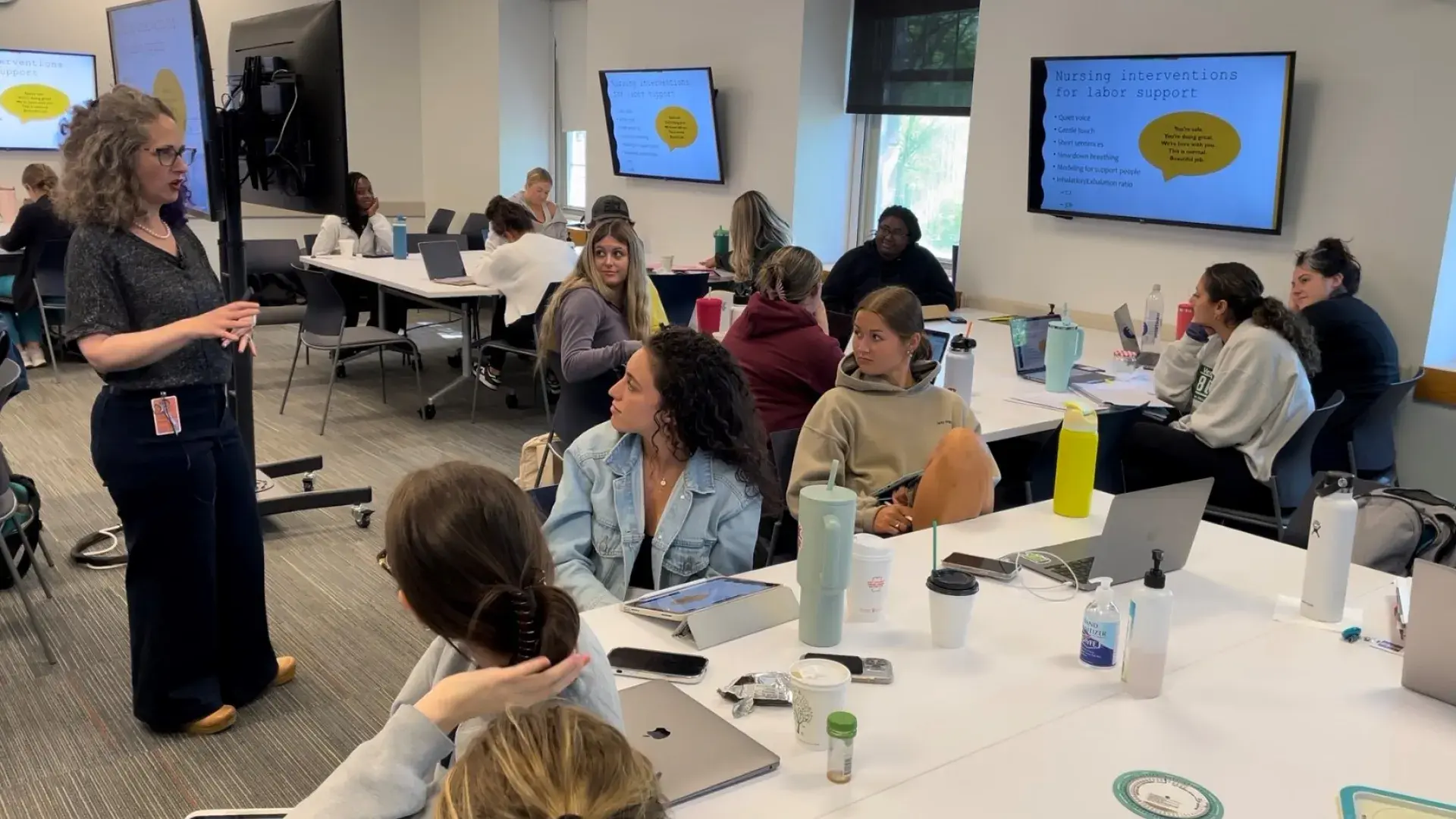 woman talking to class 