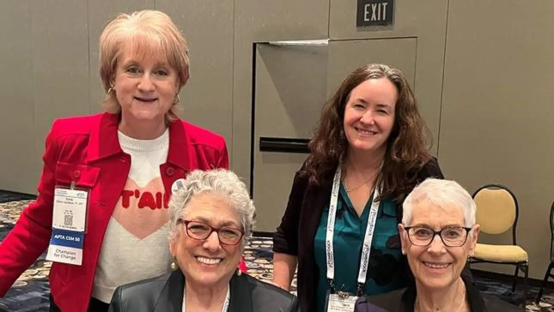 Four women pose for a photo