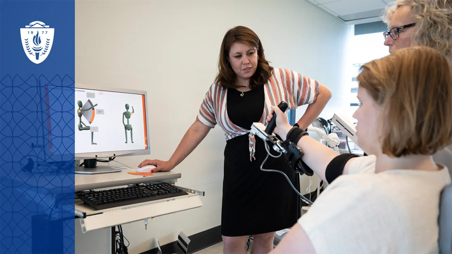 woman uses technology in occupational therapy robotic hand with computer program