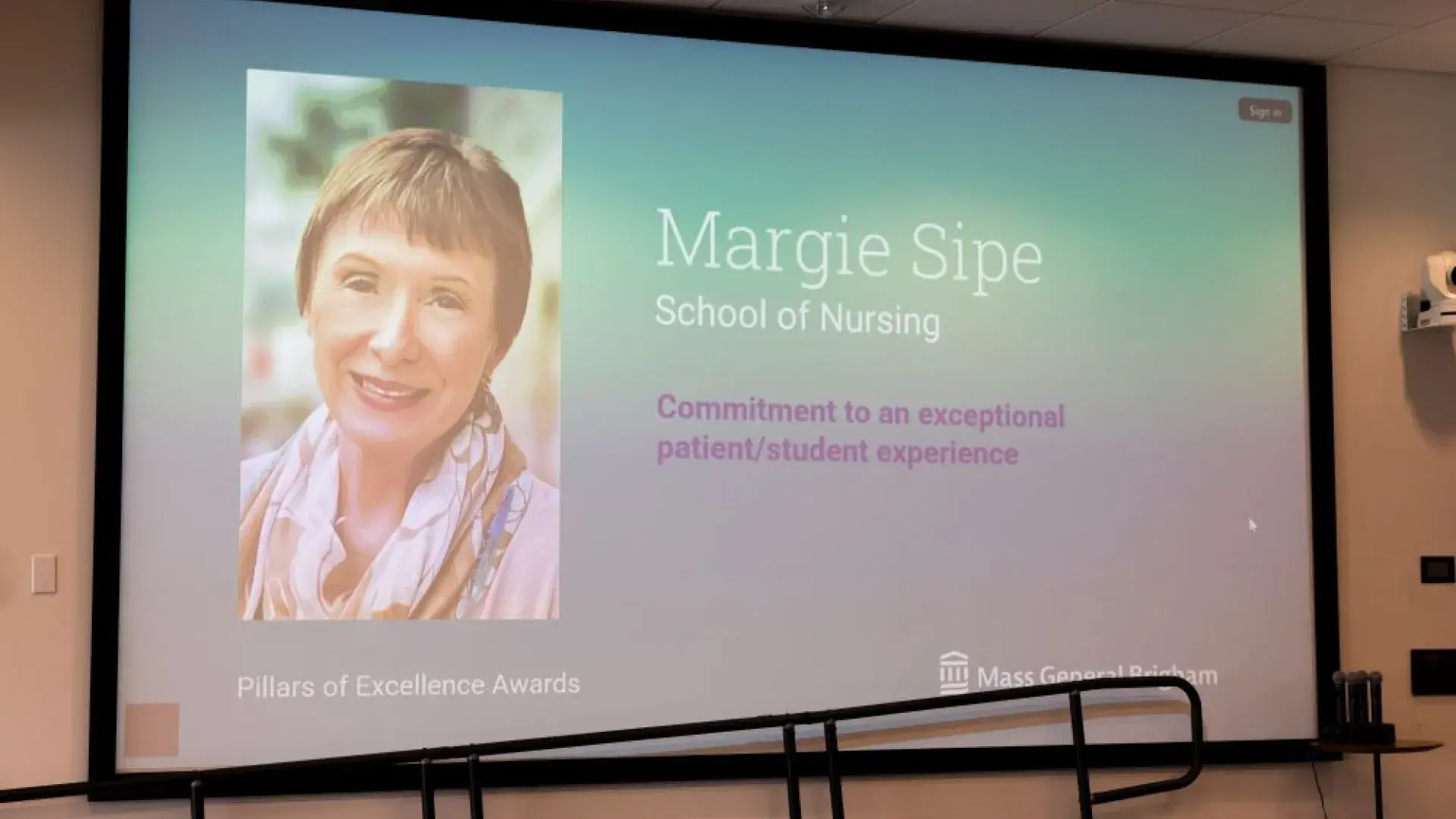 A screen with the photo and name