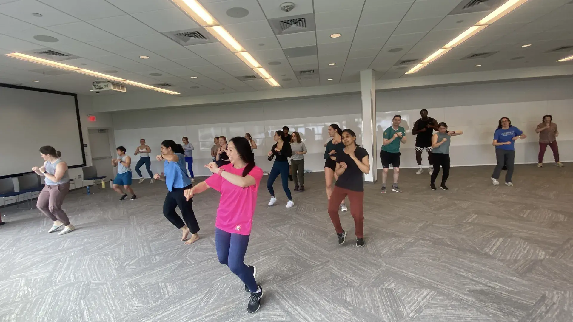 Woman leading dance class 