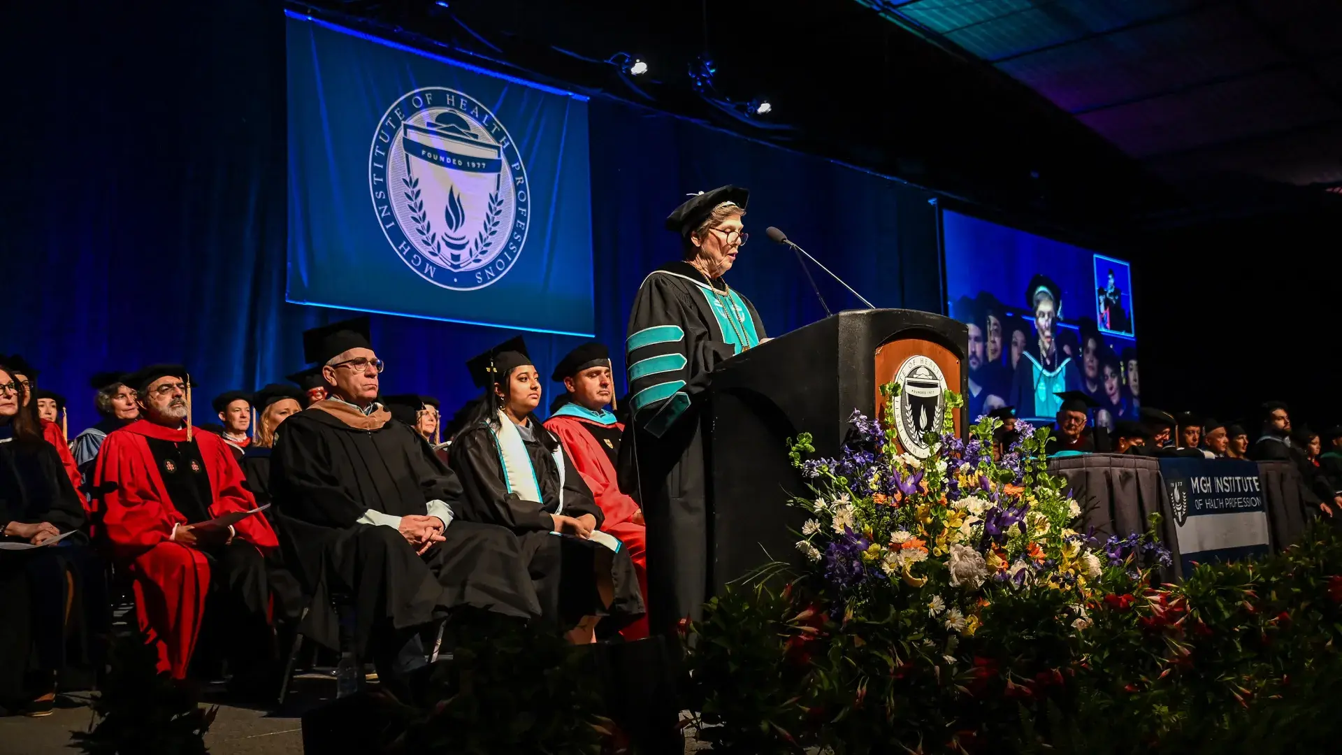 woman at commencement podium