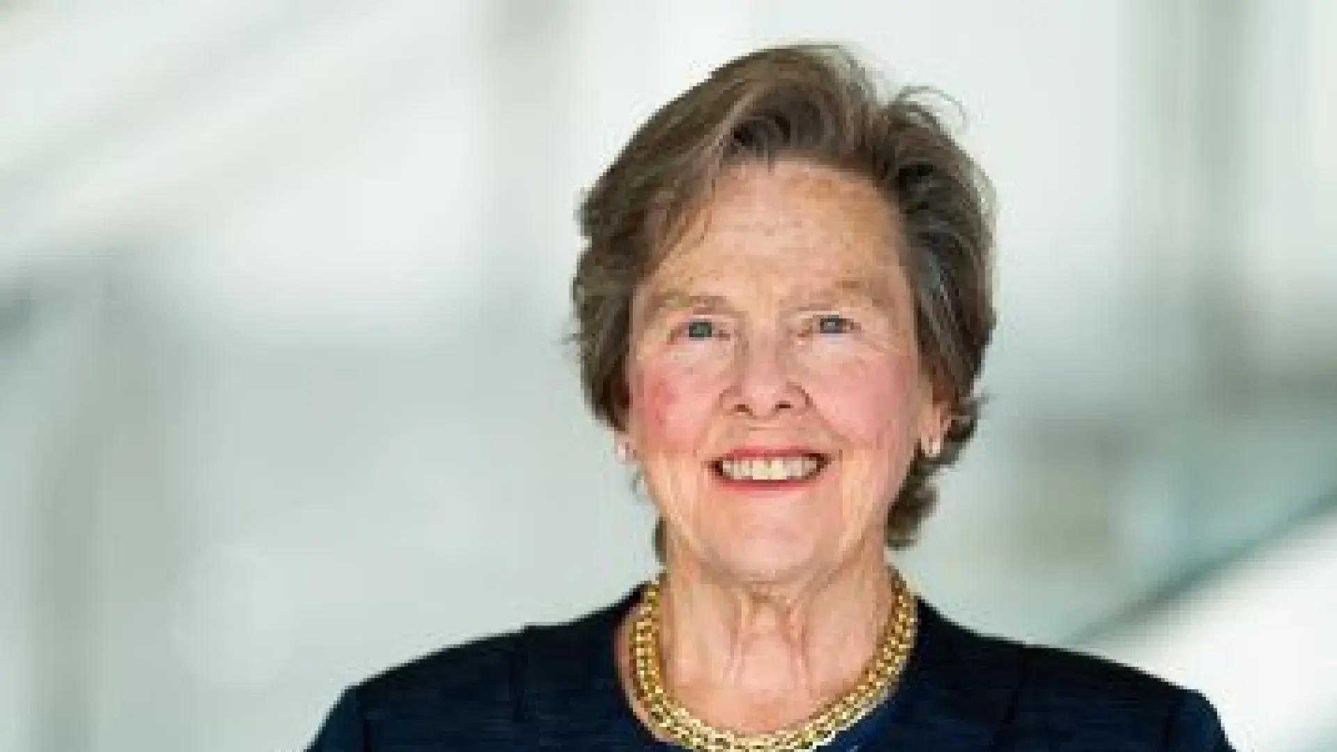 The headshot of a woman