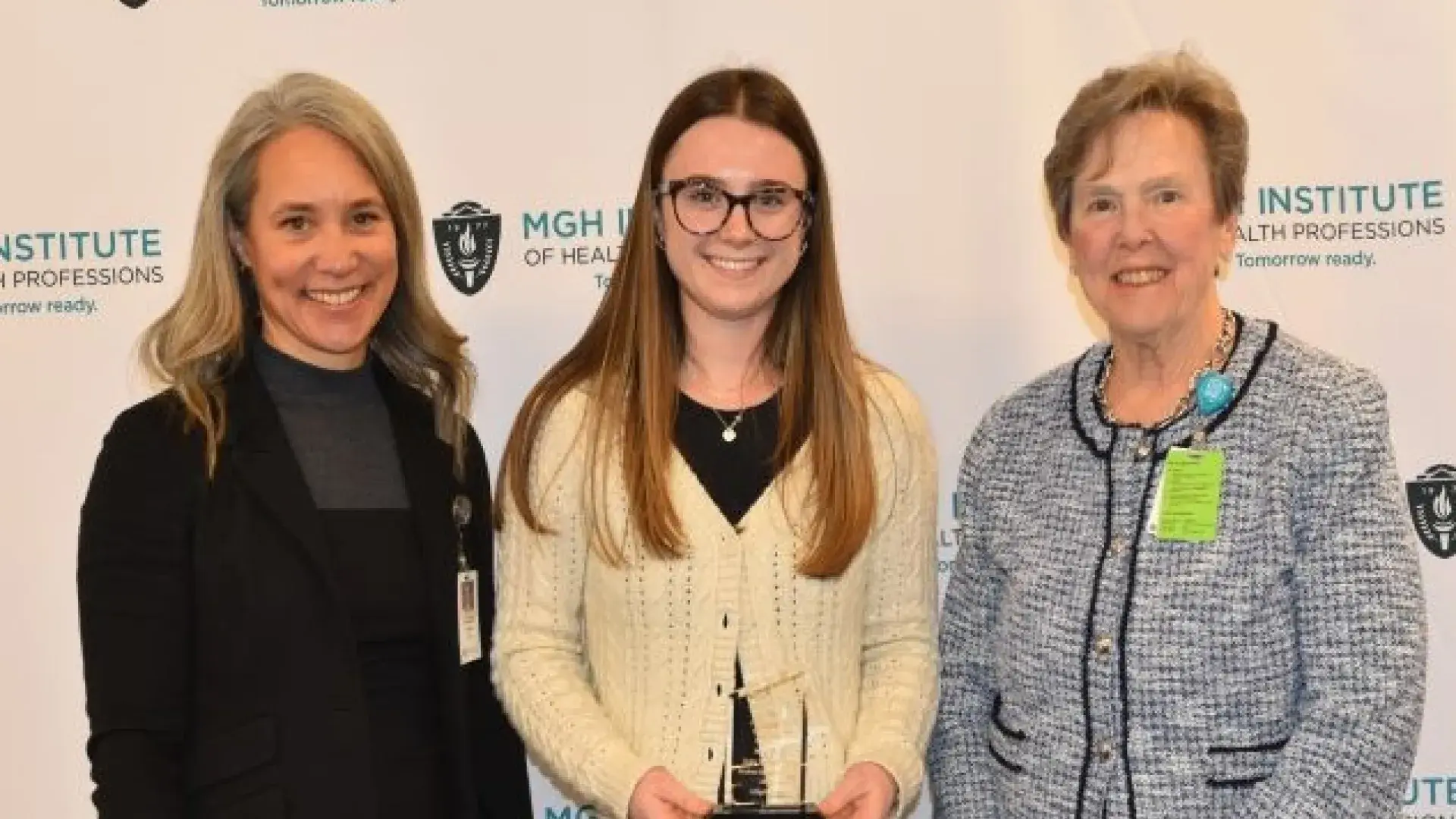 three women and an award
