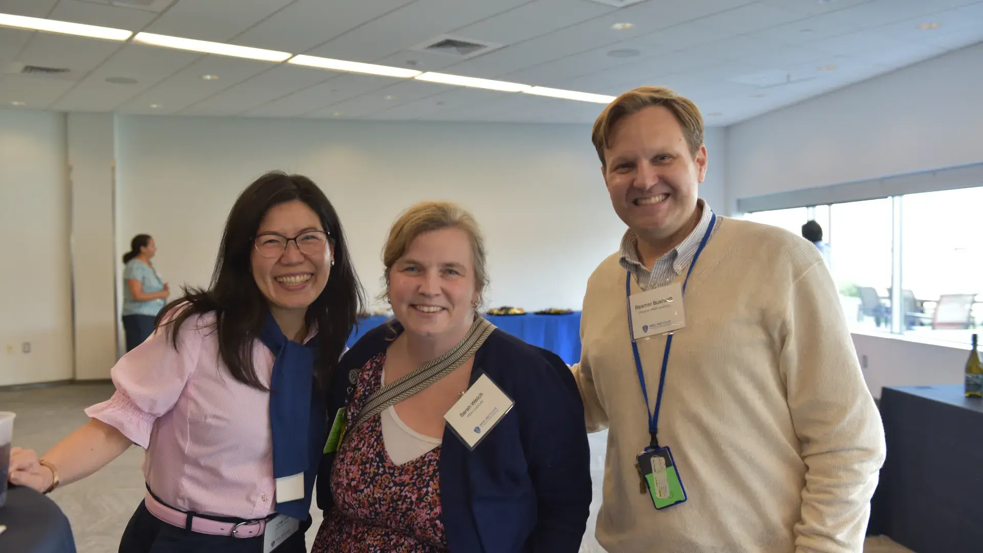 A photo of three people.