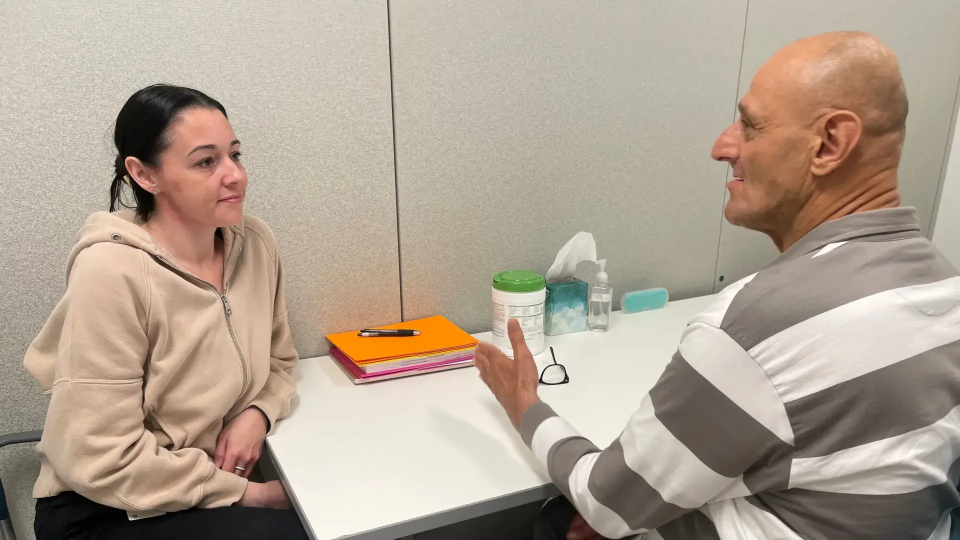 student working with client 