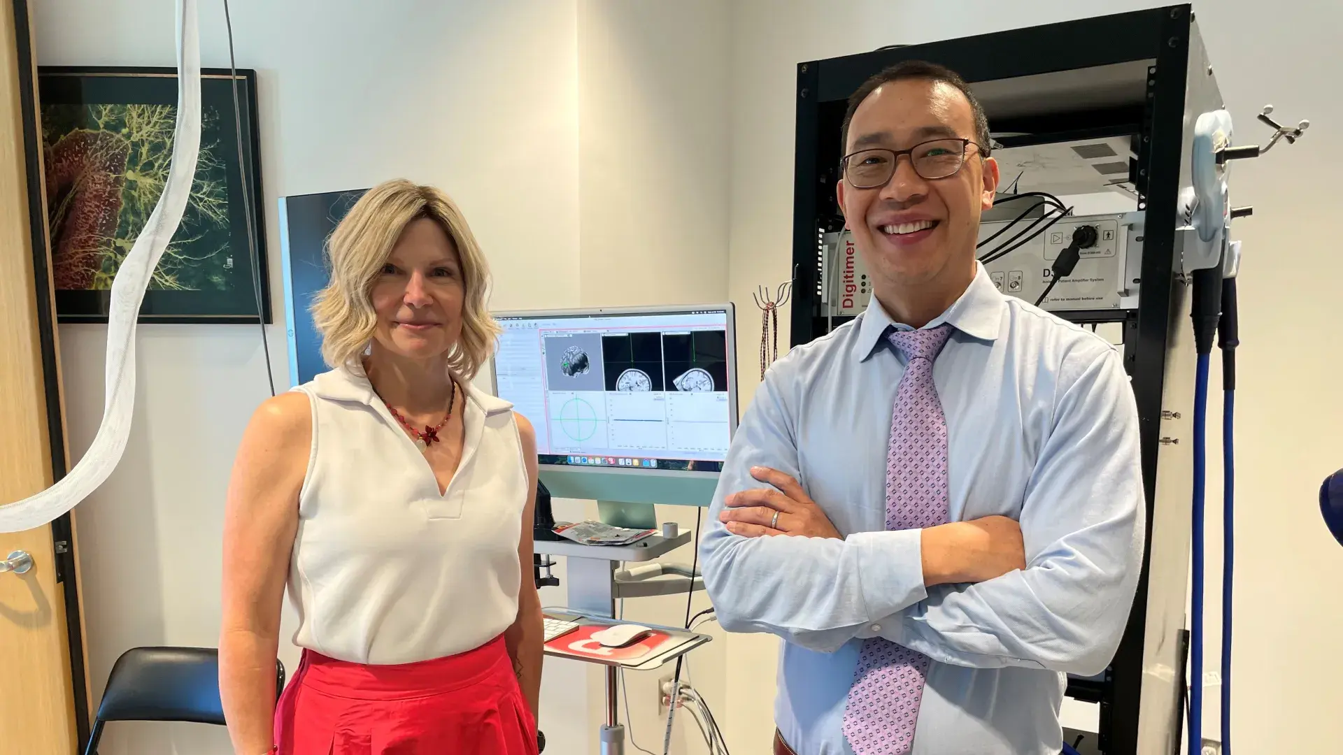 man and woman standing in lab