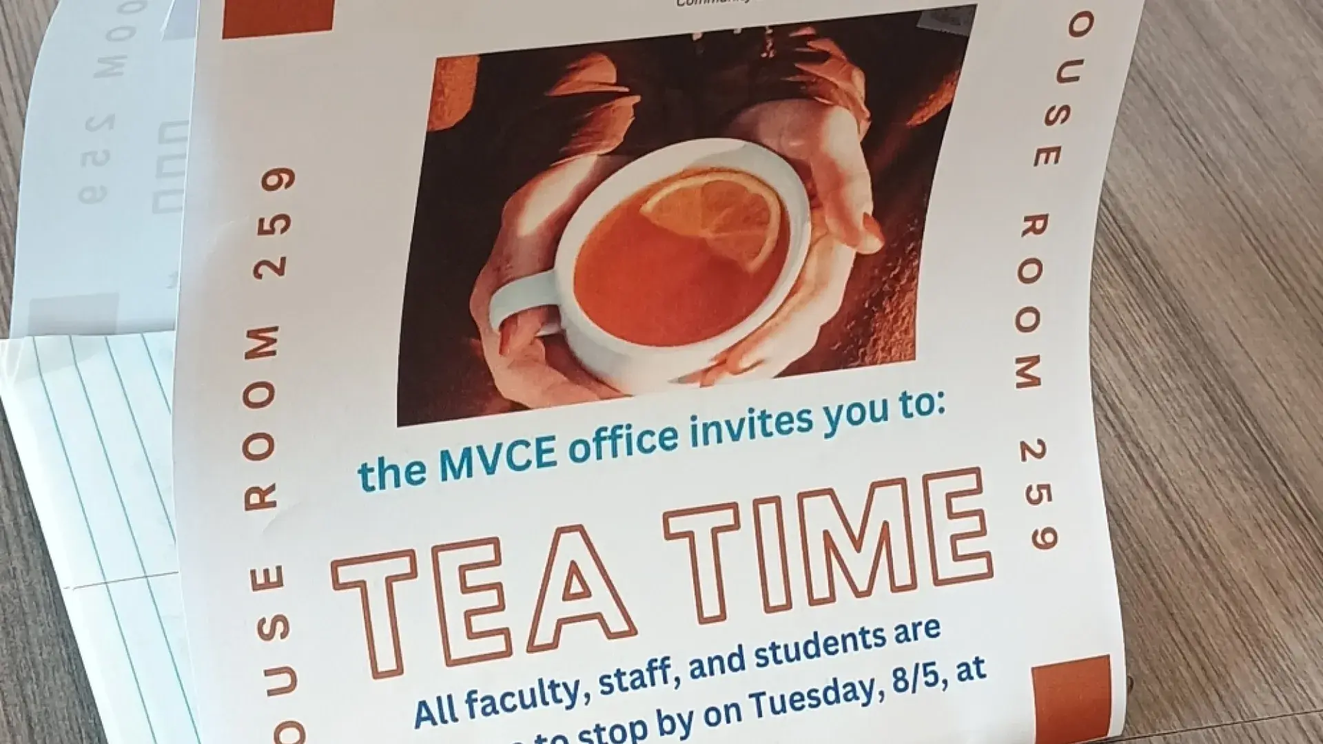 A sign on a table with the words Tea Time