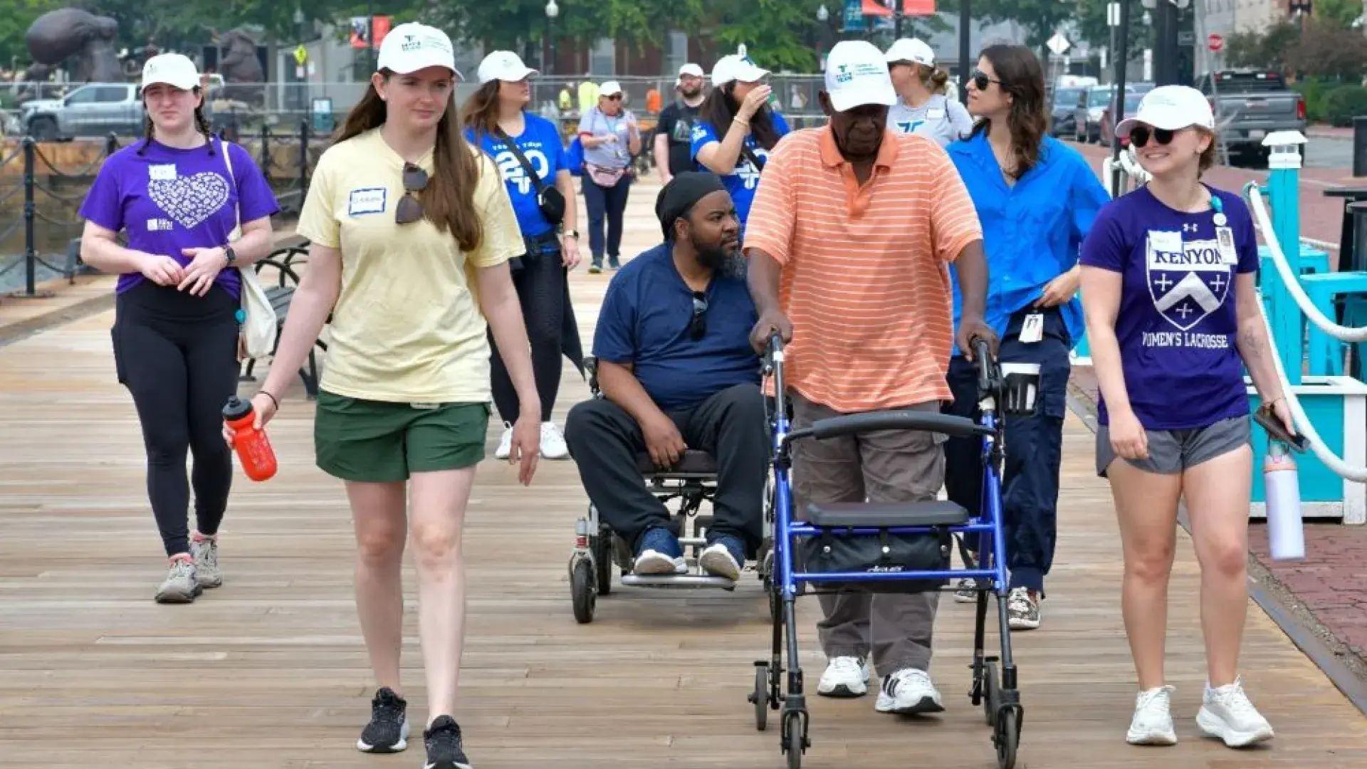 group of people walking on a path