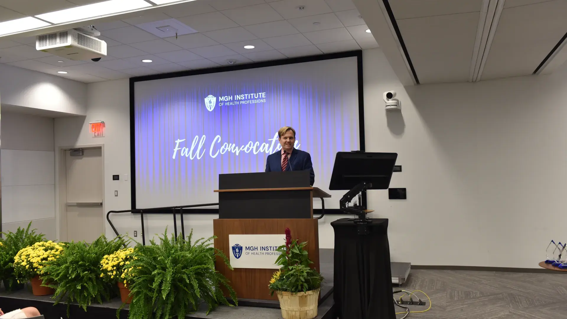 Man standing at podium