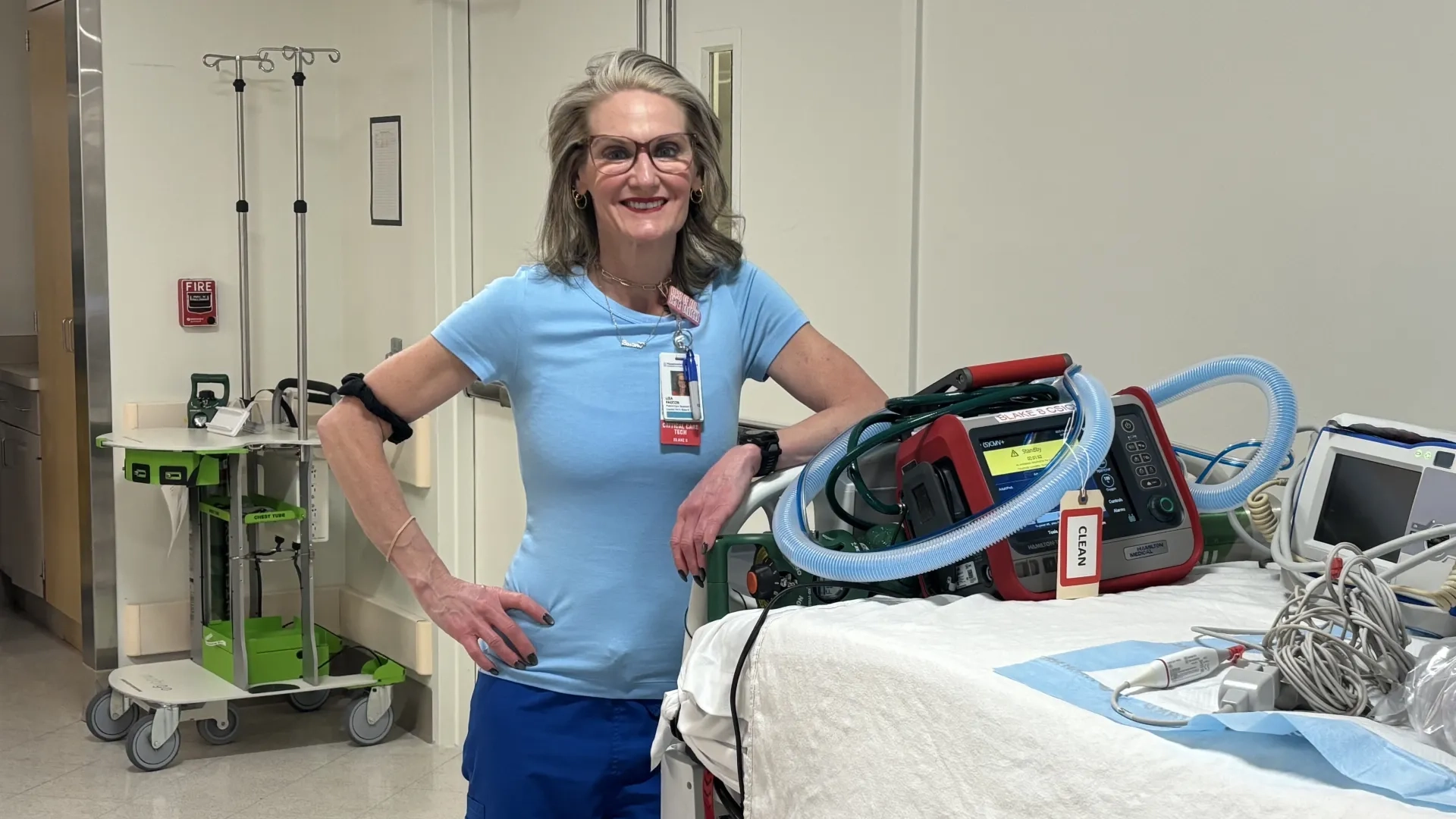 woman next to gurney 