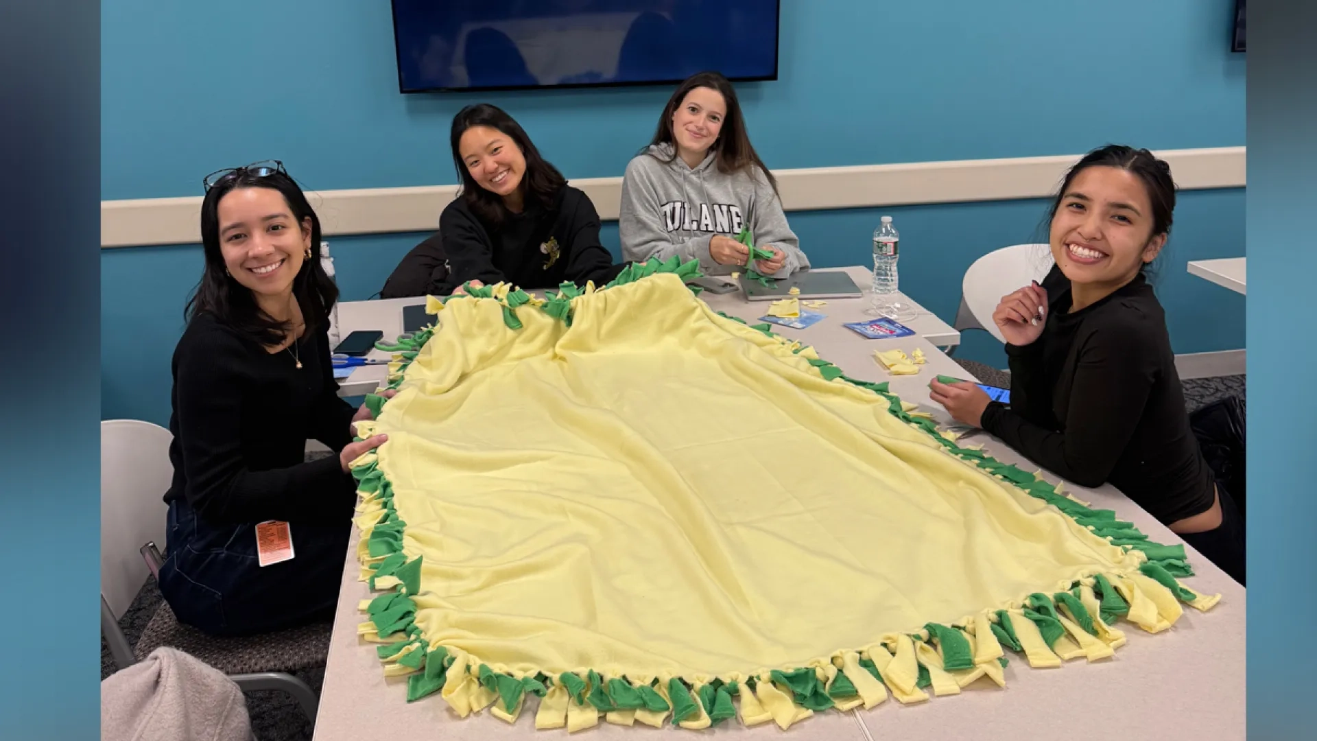 four students at table 