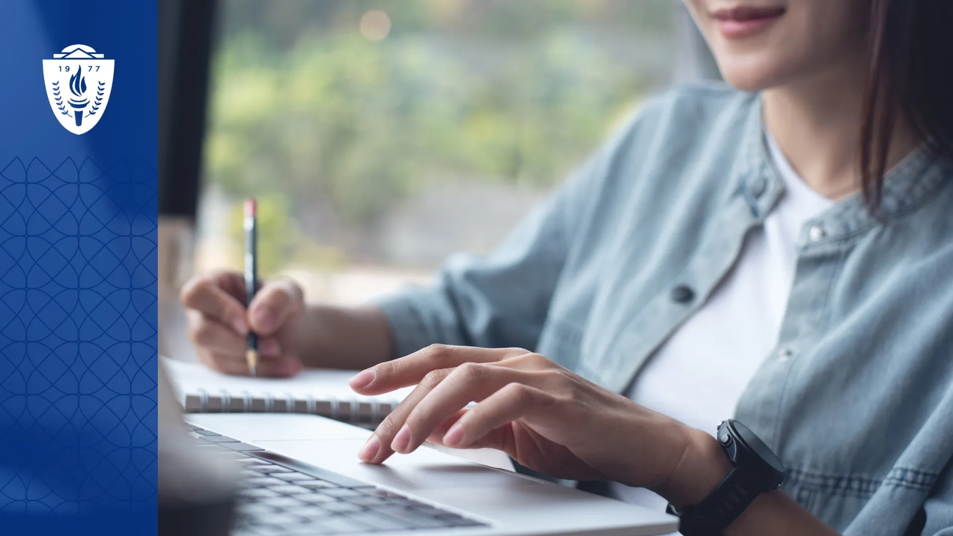 woman shows how to write a graduate program application essay on a laptop
