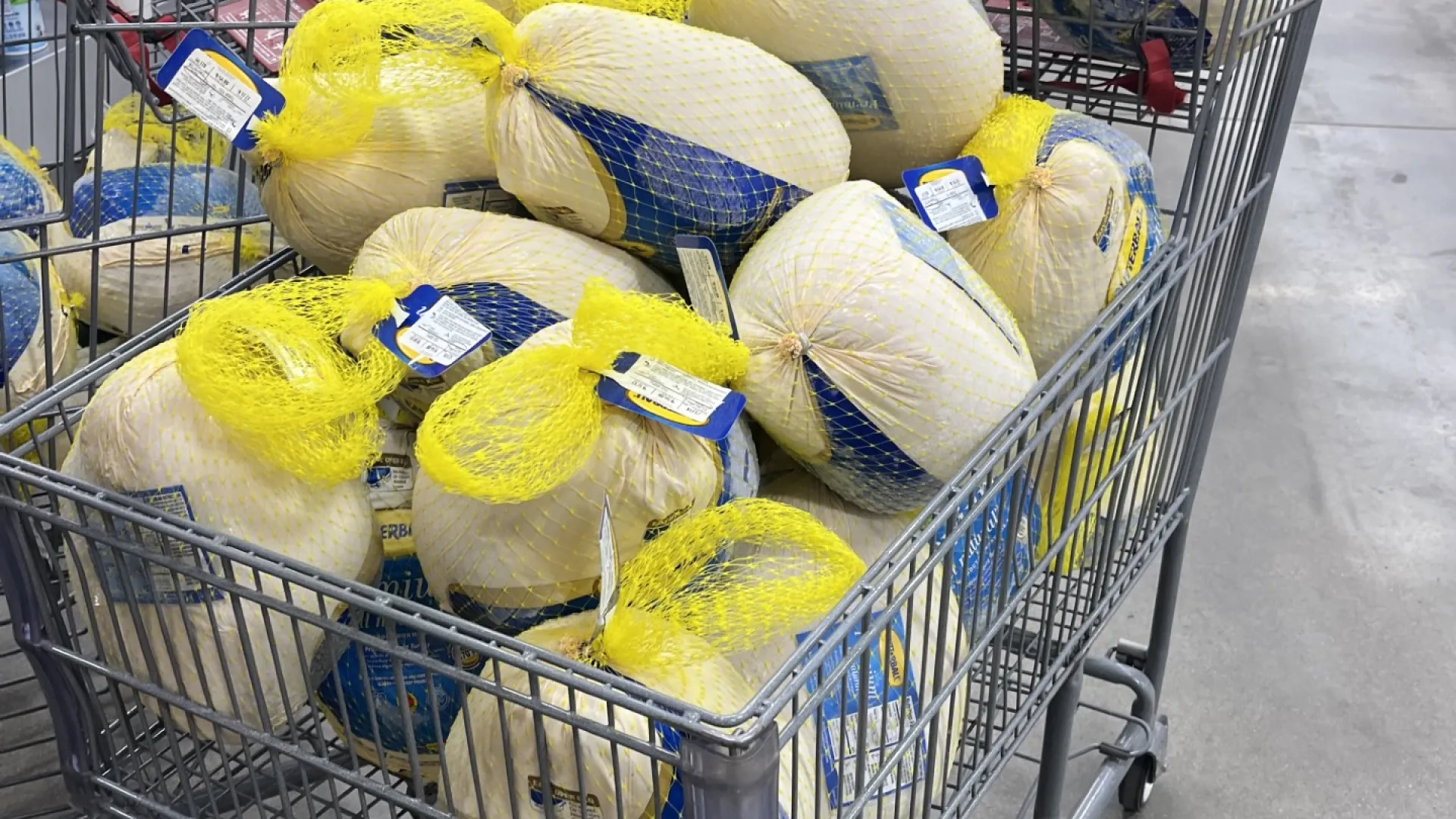 A shopping cart full of turkeys