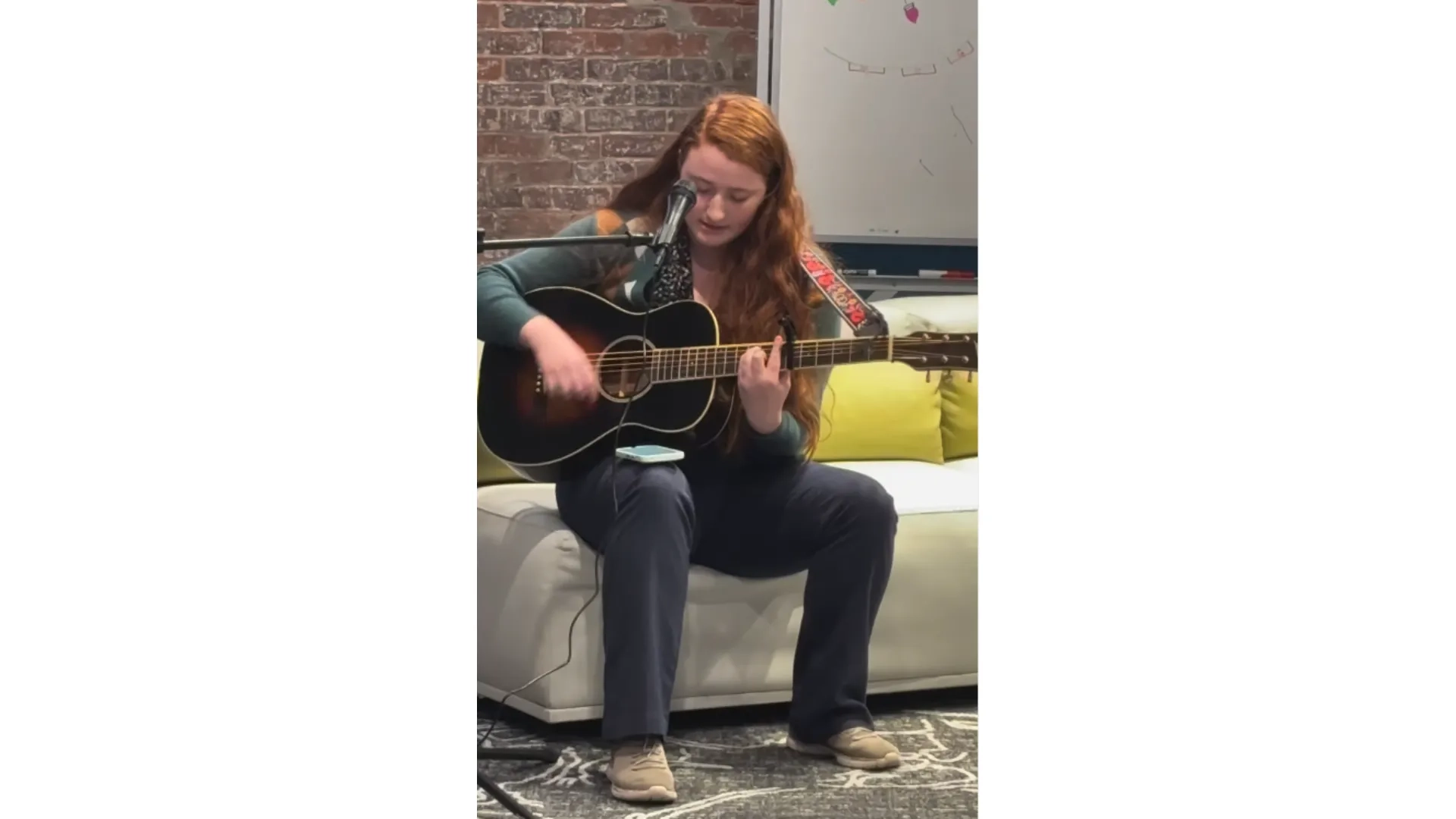 woman playing guitar