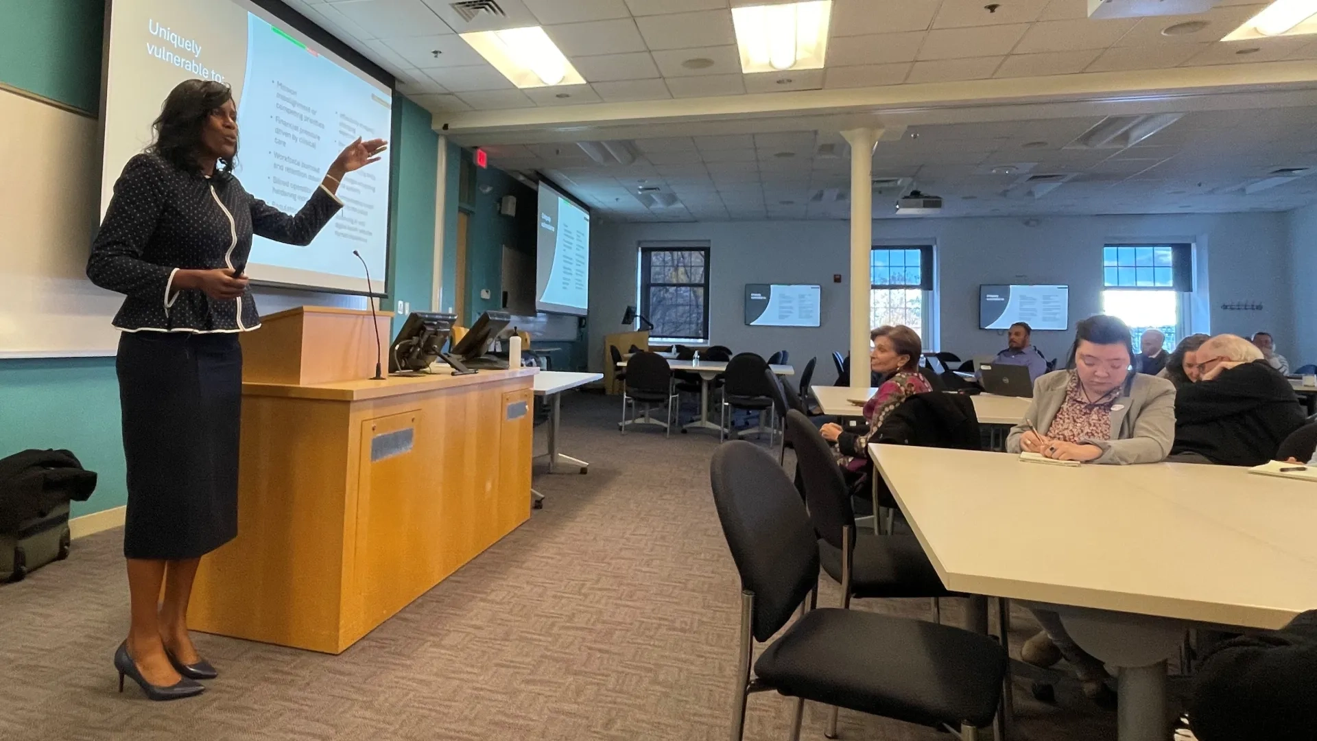 Woman talking to group 