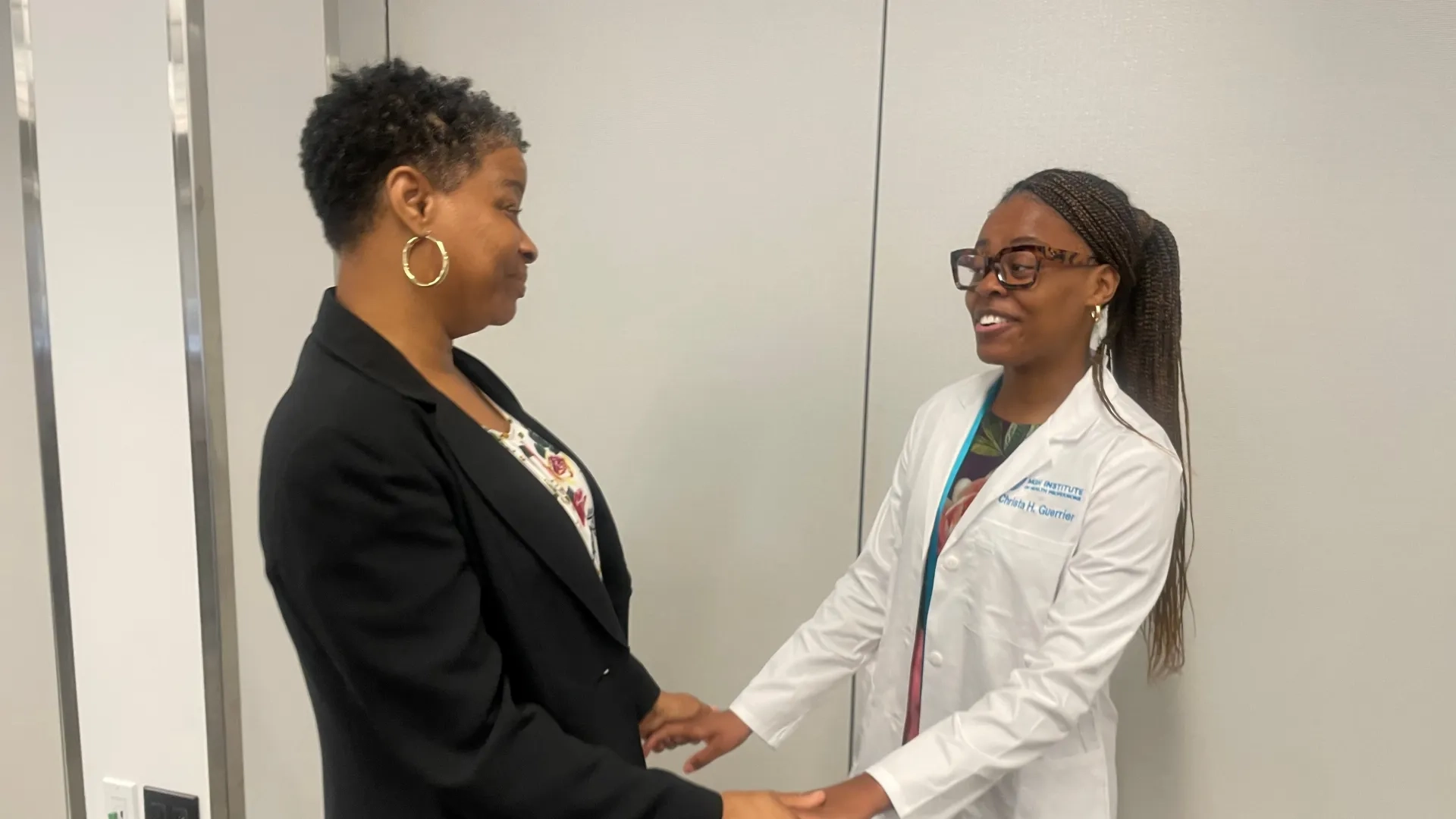mom and daughter holding hands 