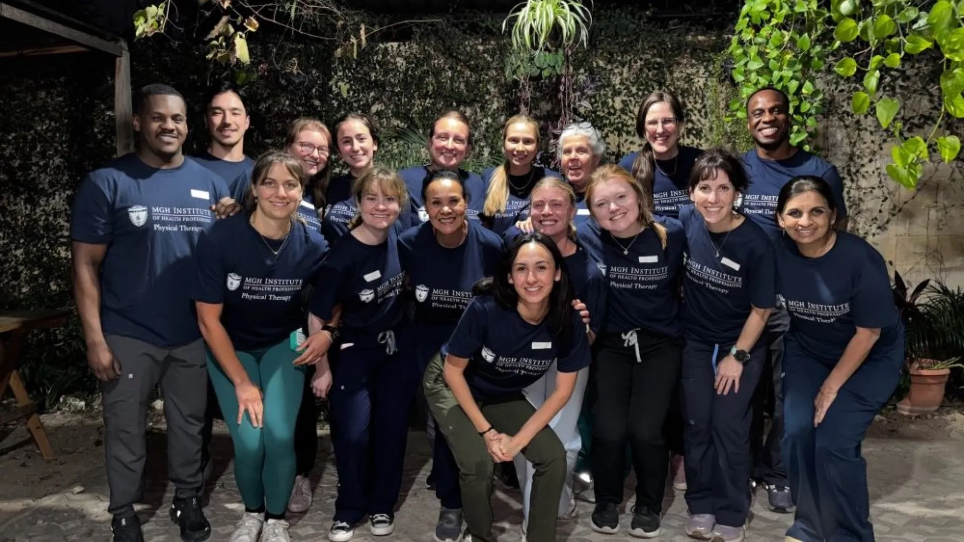 Group posing together outside