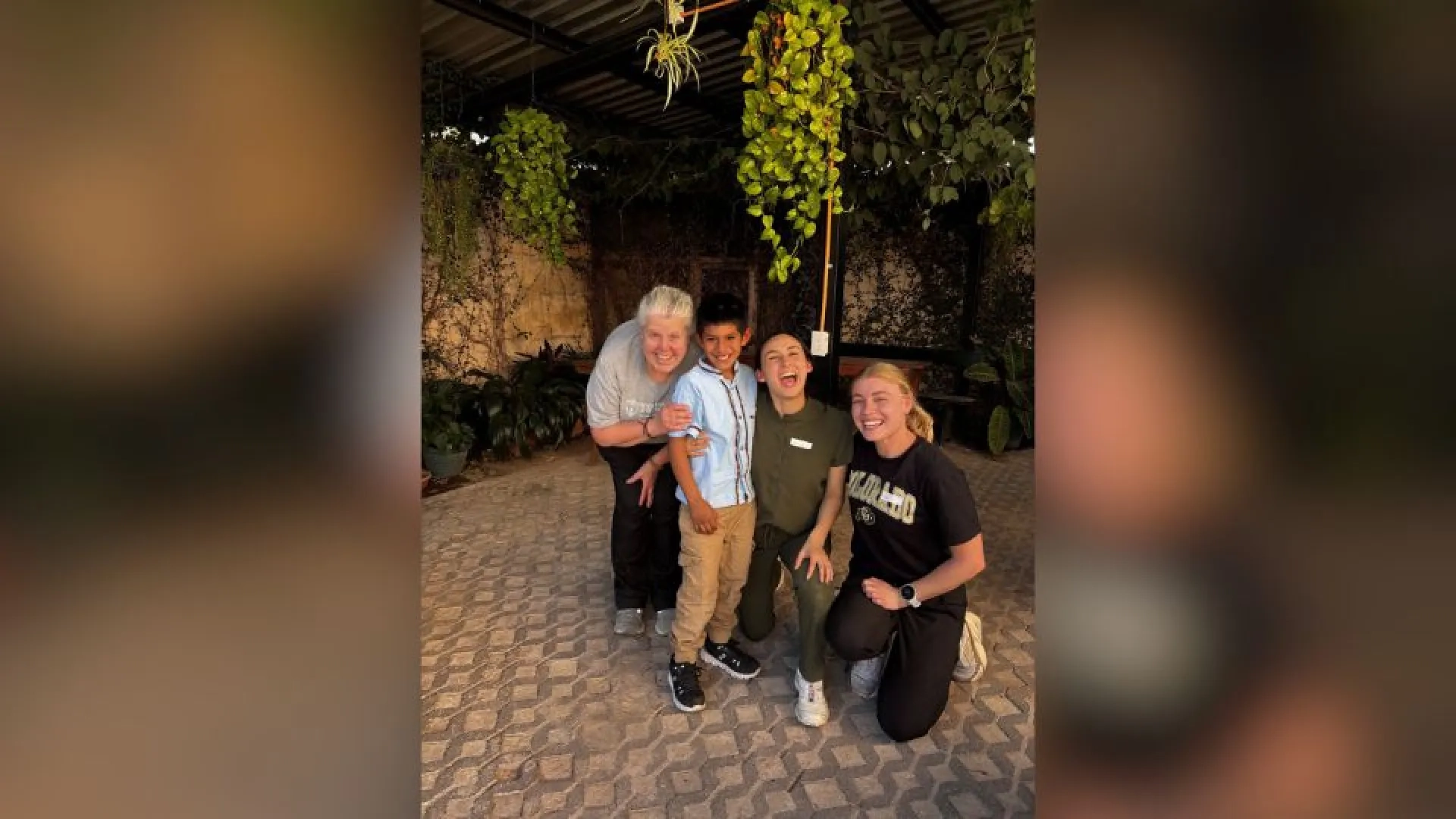 Group of people posing outside