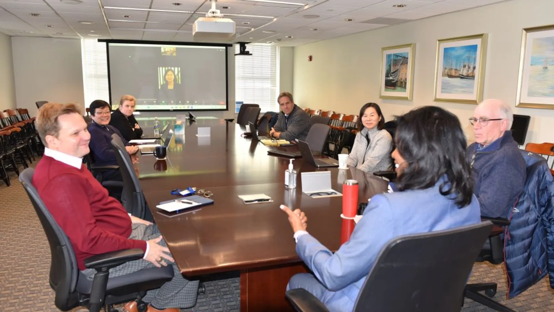 people sitting around a large table