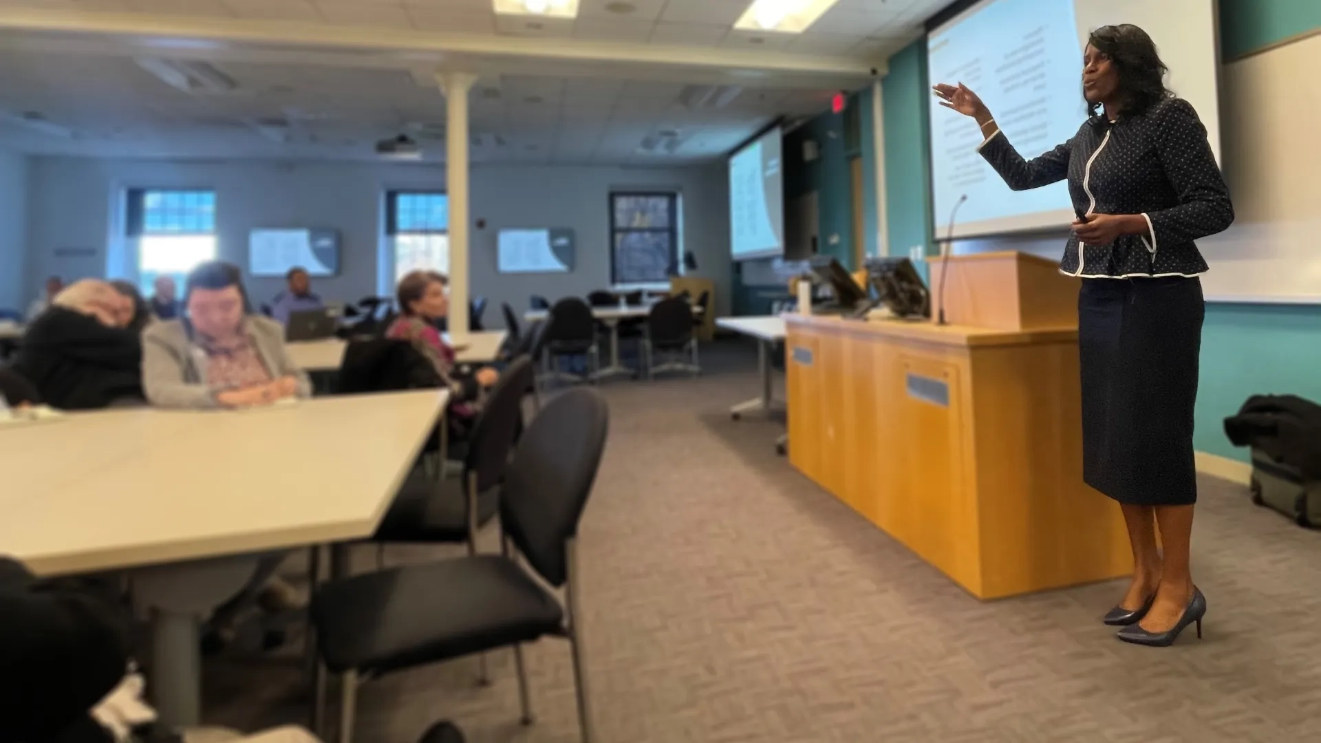 deborah presents to a room of people