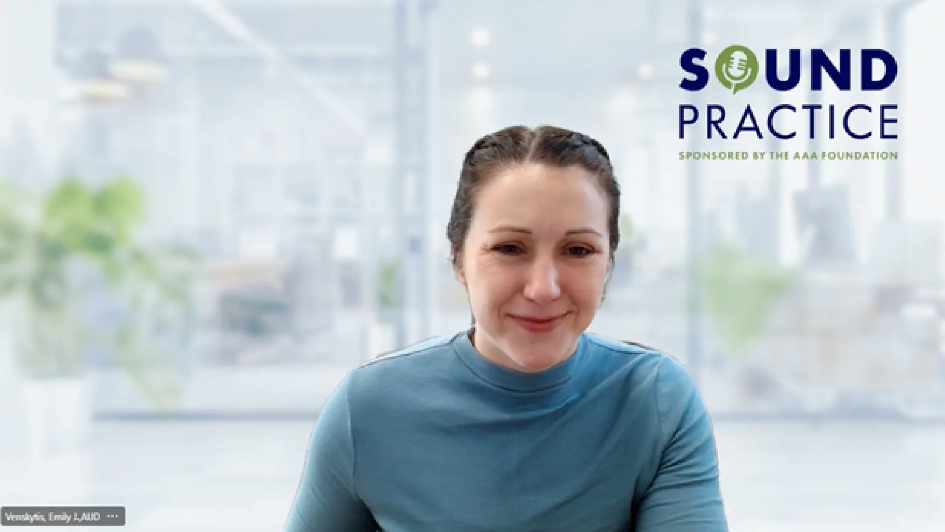 woman in front of a clear screen