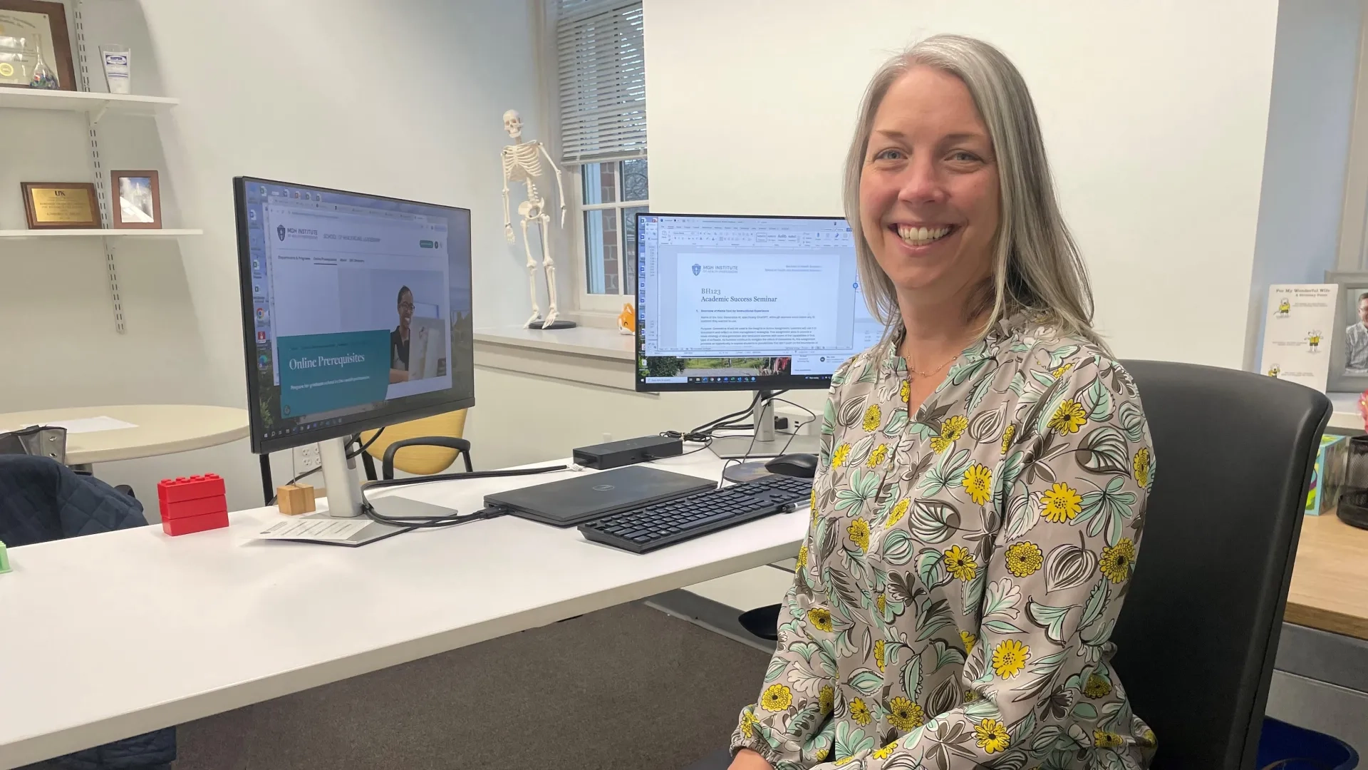kim mace in front of a computer