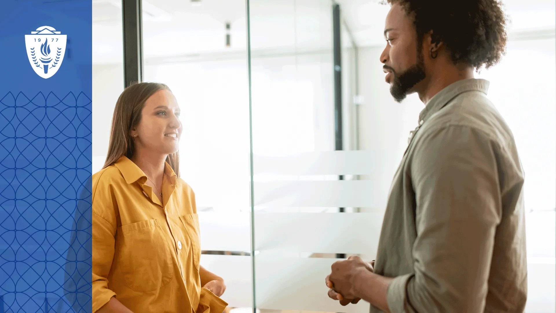 Woman wearing yellow shirt and man wearing green shirt standing in front of each other