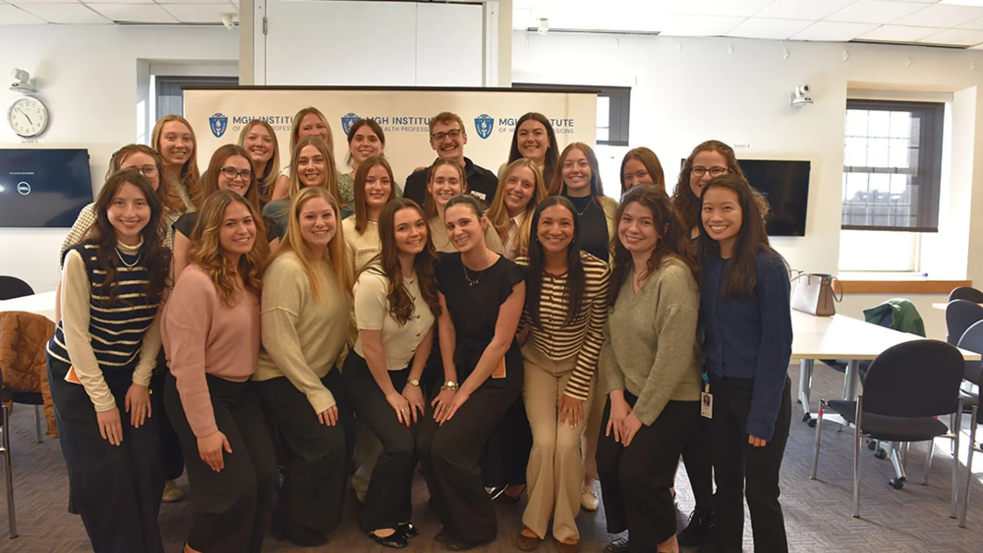 A group of people pose for a photo  
