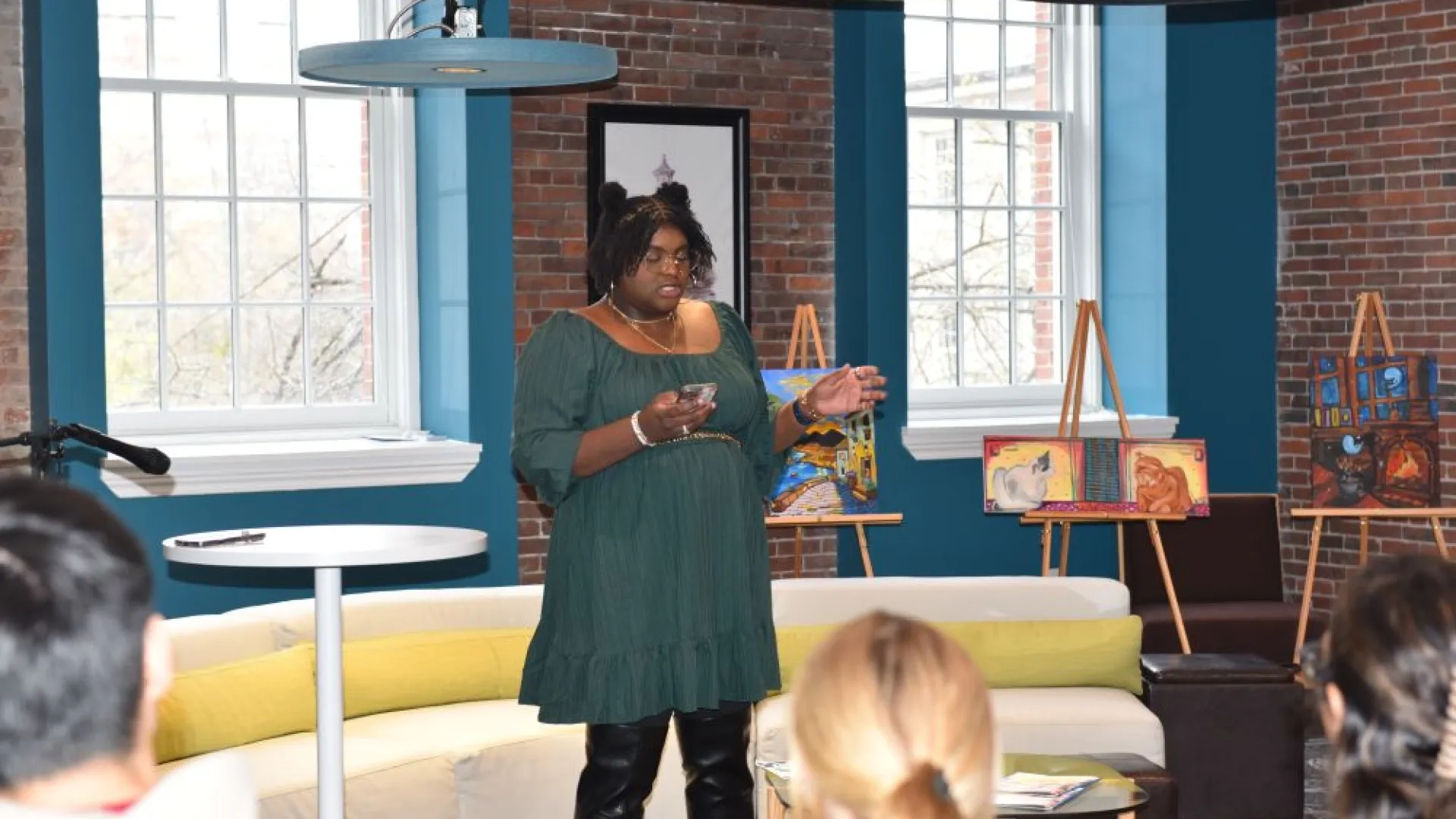 woman standing in front of a crowd 