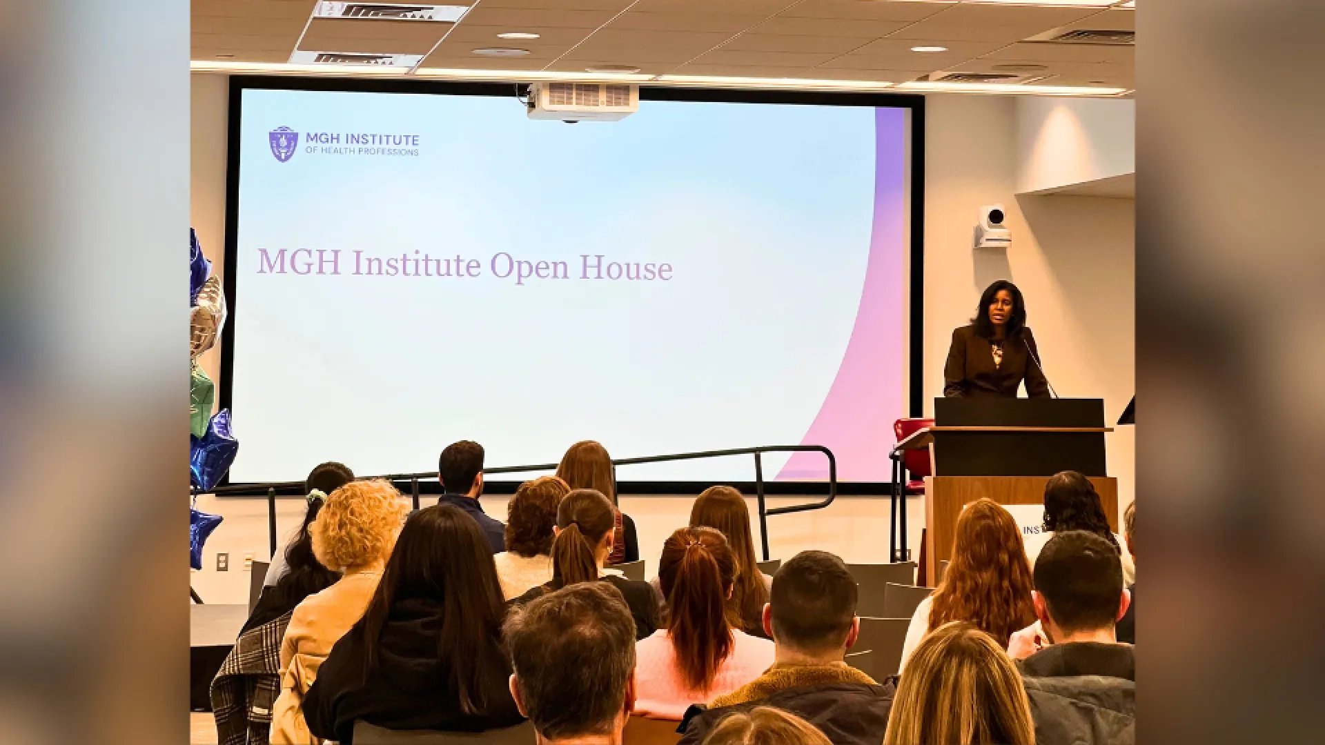 Woman standing at a podium