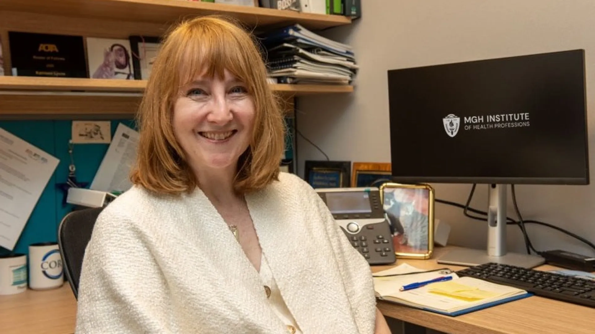 woman sitting at desk 
