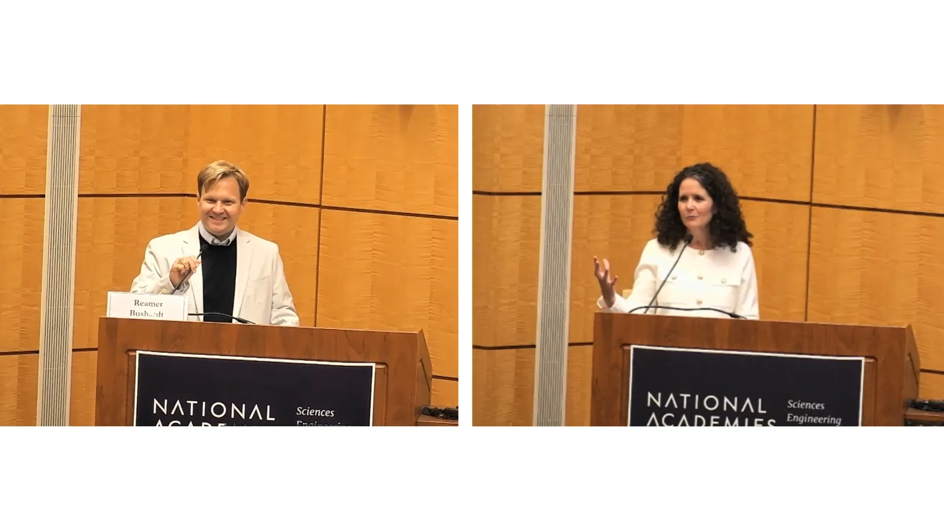 A man and a woman standing at a podium wearing white