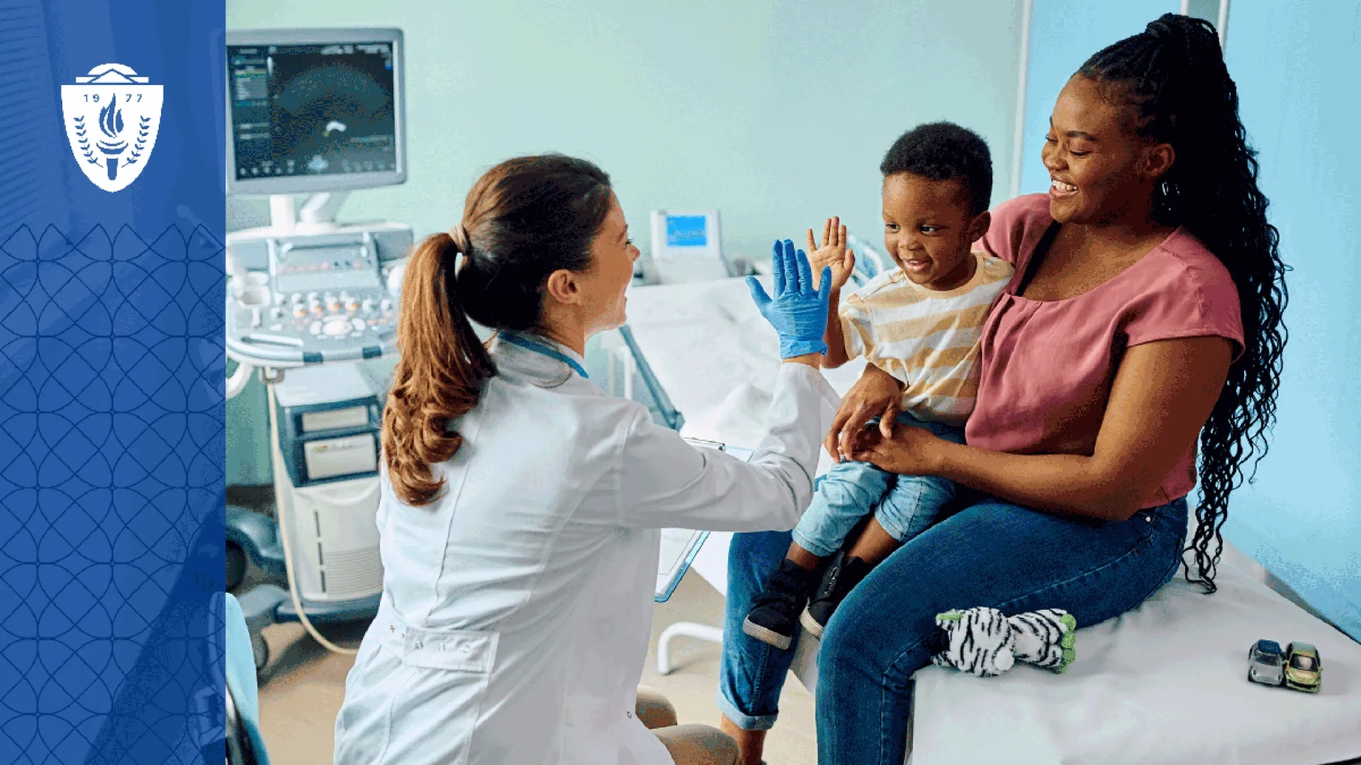 Mother and her child sitting in exam room while the nurse high fives the child