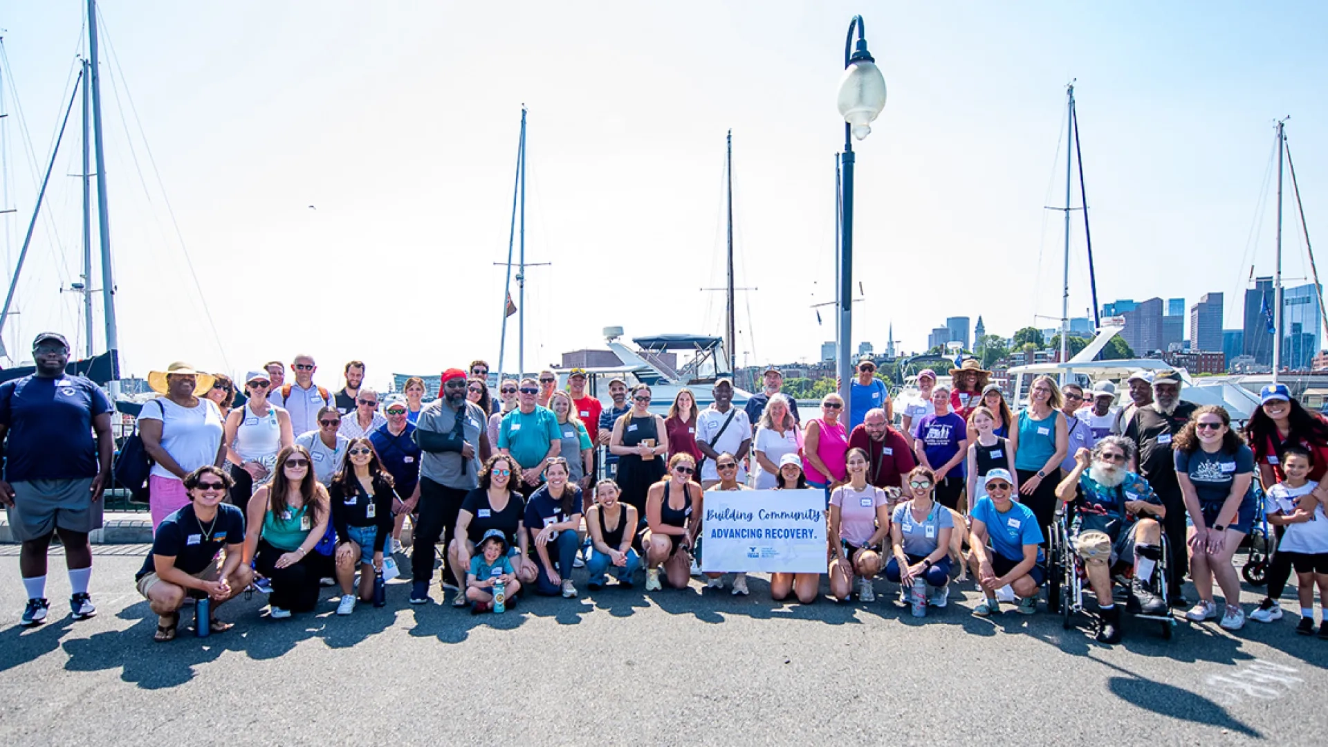 A group photo of stroke survivors, care partners, students, faculty, staff, and community partners after the Waterfront Wellness Walk