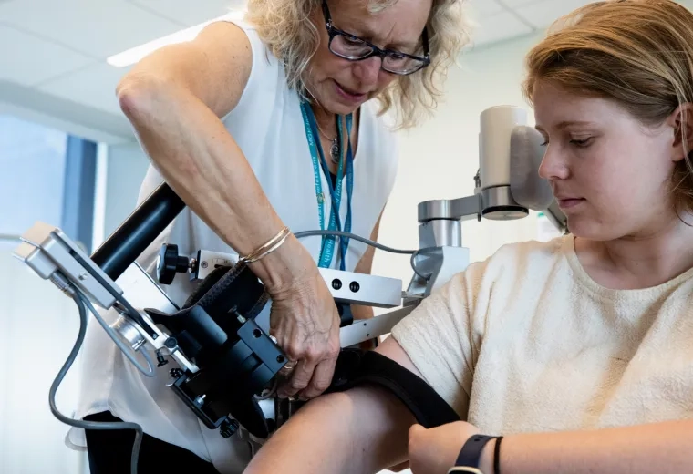Rehab specialist working with a patient