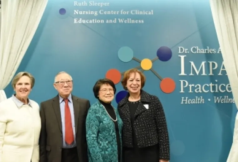 Tom and May Chin, center, with President Paula Milone-Nuzzo (far left) and School of Nursing Dean Inez Tuck (far right), at ceremony to dedicate the Ruth Sleeper Nursing Center for Clinical Education and Wellness.