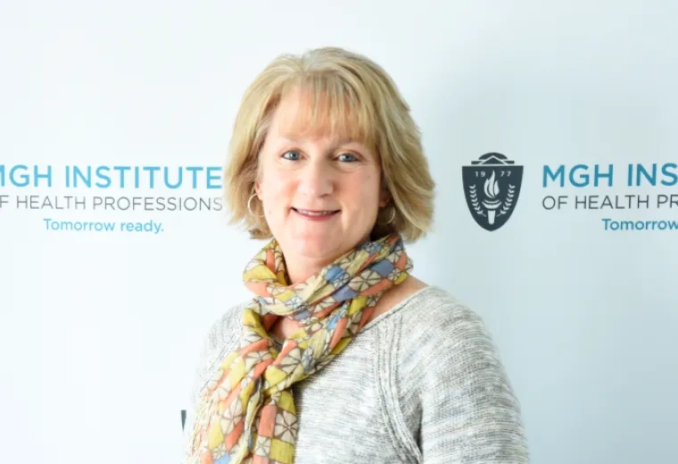 Headshot of a faculty member in the MGH IHP Doctor of Physical Therapy program with the institute's branding in the background