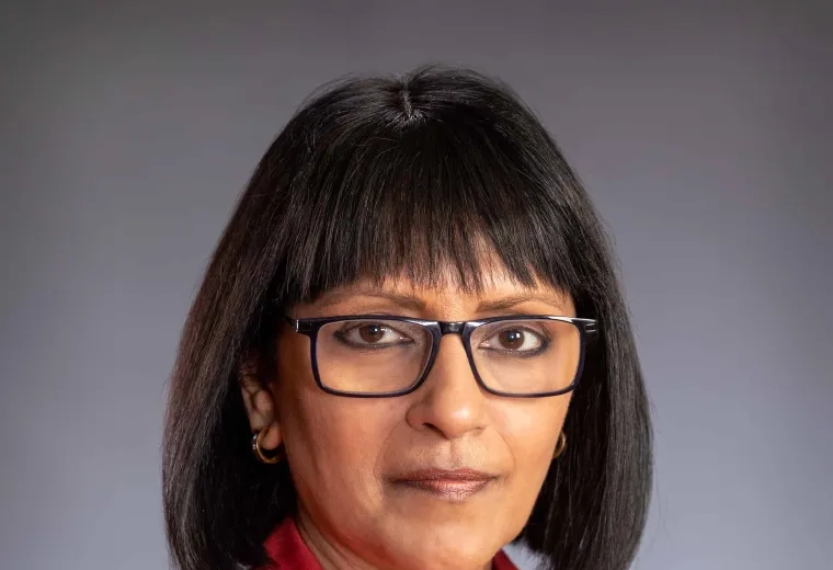 Subha Ramani in red blazer